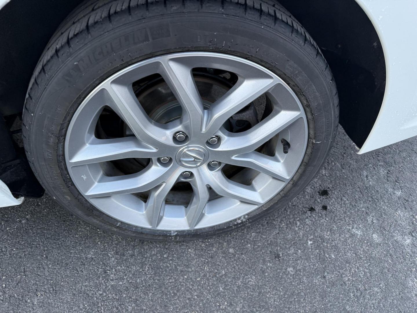 2021 White /Black Acura ILX Base (19UDE2F36MA) with an 2.0L I4 16V DOHC engine, 8A transmission, located at 547 E. Main St., Orwell, OH, 44076, (440) 437-5893, 41.535435, -80.847855 - This 2021 Acura ILX, equipped with a 2.4-liter Earthdreams I4 engine and an 8-speed automatic transmission, delivers a refined driving experience with efficient performance, achieving up to 34 MPG on the highway. The leather interior with heated front seats offers a touch of luxury, while features l - Photo#20