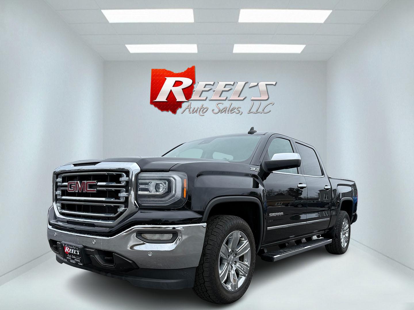 2016 Black /Black GMC Sierra 1500 SLT Crew Cab Short Box 4WD (3GTU2NEC7GG) with an 5.3L V8 OHV 16V engine, 8-Speed Automatic transmission, located at 547 E. Main St., Orwell, OH, 44076, (440) 437-5893, 41.535435, -80.847855 - This One Owner 2016 GMC Sierra 1500 SLT Crew Cab, featuring a 5.3 Vortec V8 engine and 8-speed automatic transmission, offers a robust driving experience with added luxury and technology. Equipped with leather interior, heated and cooled front seats, and a power sunroof, it provides comfort and conv - Photo#0