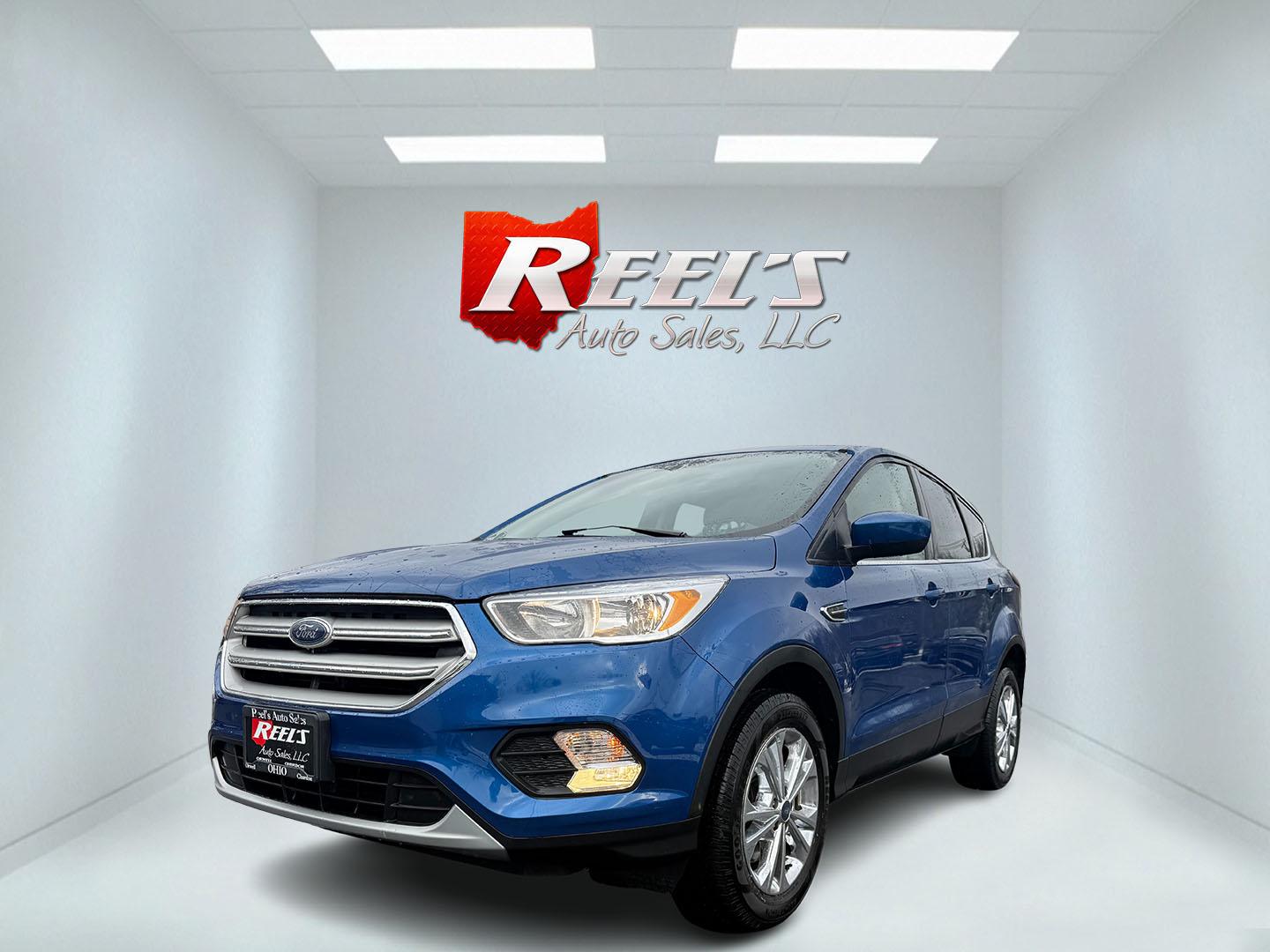 2019 Blue /Black Ford Escape SE 4WD (1FMCU9GD2KU) with an 1.5L I4 DOHC 16V Turbo engine, 6A transmission, located at 547 E. Main St., Orwell, OH, 44076, (440) 437-5893, 41.535435, -80.847855 - Photo#0