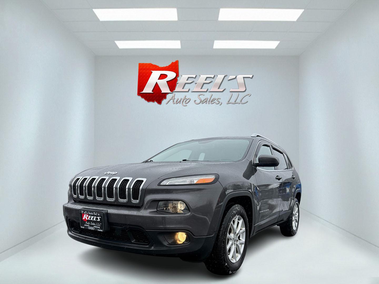 2015 Silver /Black Jeep Cherokee Latitude 4WD (1C4PJMCB7FW) with an 2.4L I4 DOHC 16V engine, 9-Speed Automatic transmission, located at 11115 Chardon Rd. , Chardon, OH, 44024, (440) 214-9705, 41.580246, -81.241943 - Photo#0