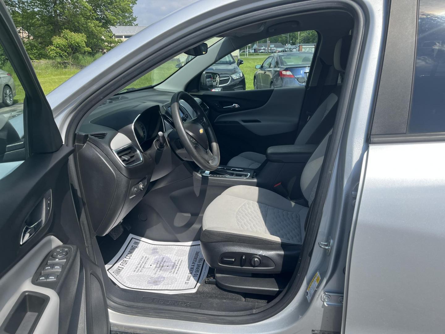 2020 Silver /Black Chevrolet Equinox 1FL AWD (3GNAX5EV2LS) with an 1.5L I4 DOHC 16V TURBO engine, 6A transmission, located at 547 E. Main St., Orwell, OH, 44076, (440) 437-5893, 41.535435, -80.847855 - This One Owner 2020 Chevrolet Equinox 1FL AWD features a turbocharged 1.5L EcoTec engine paired with a 6-speed automatic transmission for efficient performance at 30 MPG highway, while its 7-inch touchscreen supports Apple CarPlay and Android Auto for seamless connectivity; additional highlights inc - Photo#24