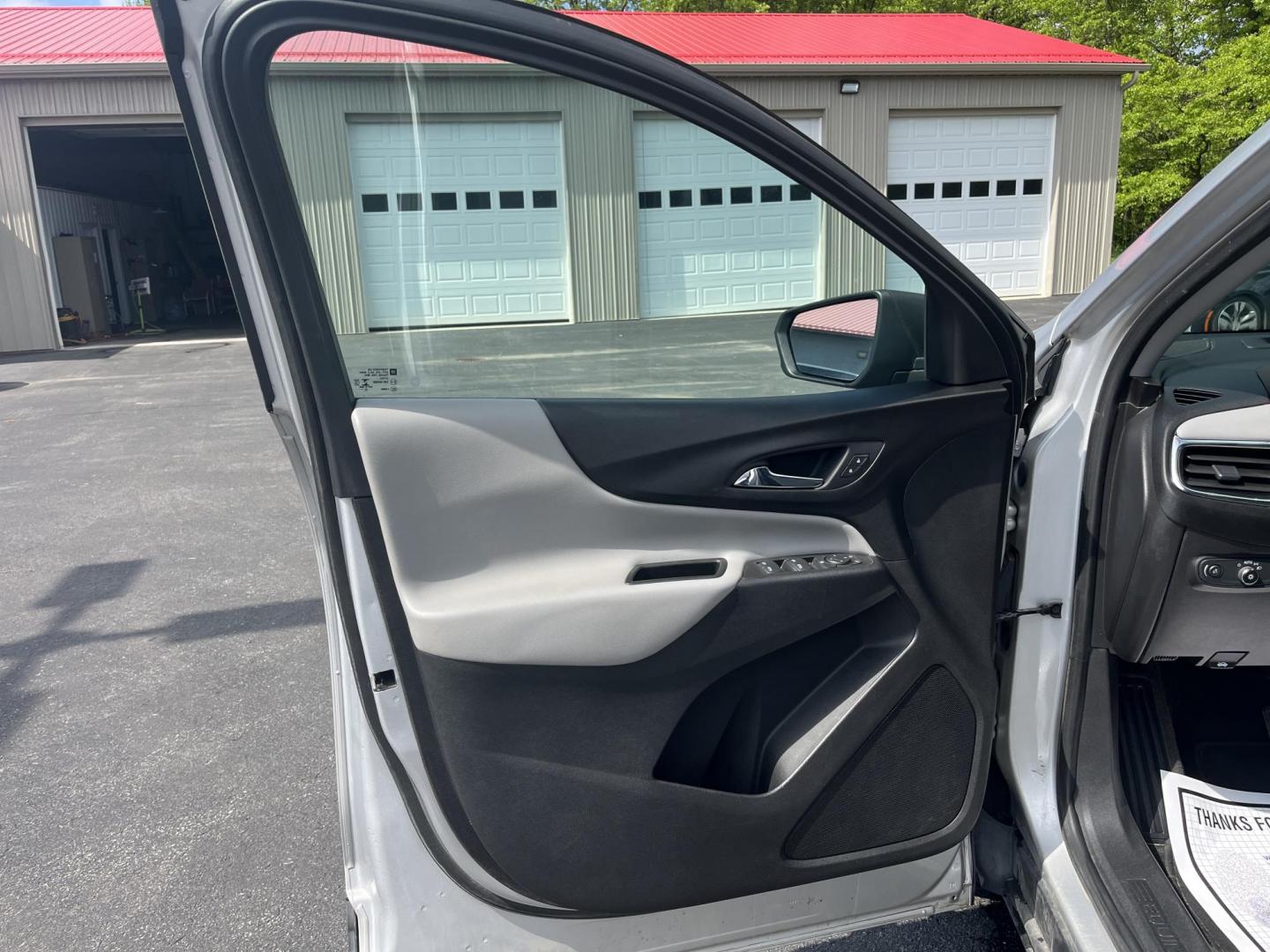 2020 Silver /Black Chevrolet Equinox 1FL AWD (3GNAX5EV2LS) with an 1.5L I4 DOHC 16V TURBO engine, 6A transmission, located at 547 E. Main St., Orwell, OH, 44076, (440) 437-5893, 41.535435, -80.847855 - This One Owner 2020 Chevrolet Equinox 1FL AWD features a turbocharged 1.5L EcoTec engine paired with a 6-speed automatic transmission for efficient performance at 30 MPG highway, while its 7-inch touchscreen supports Apple CarPlay and Android Auto for seamless connectivity; additional highlights inc - Photo#23