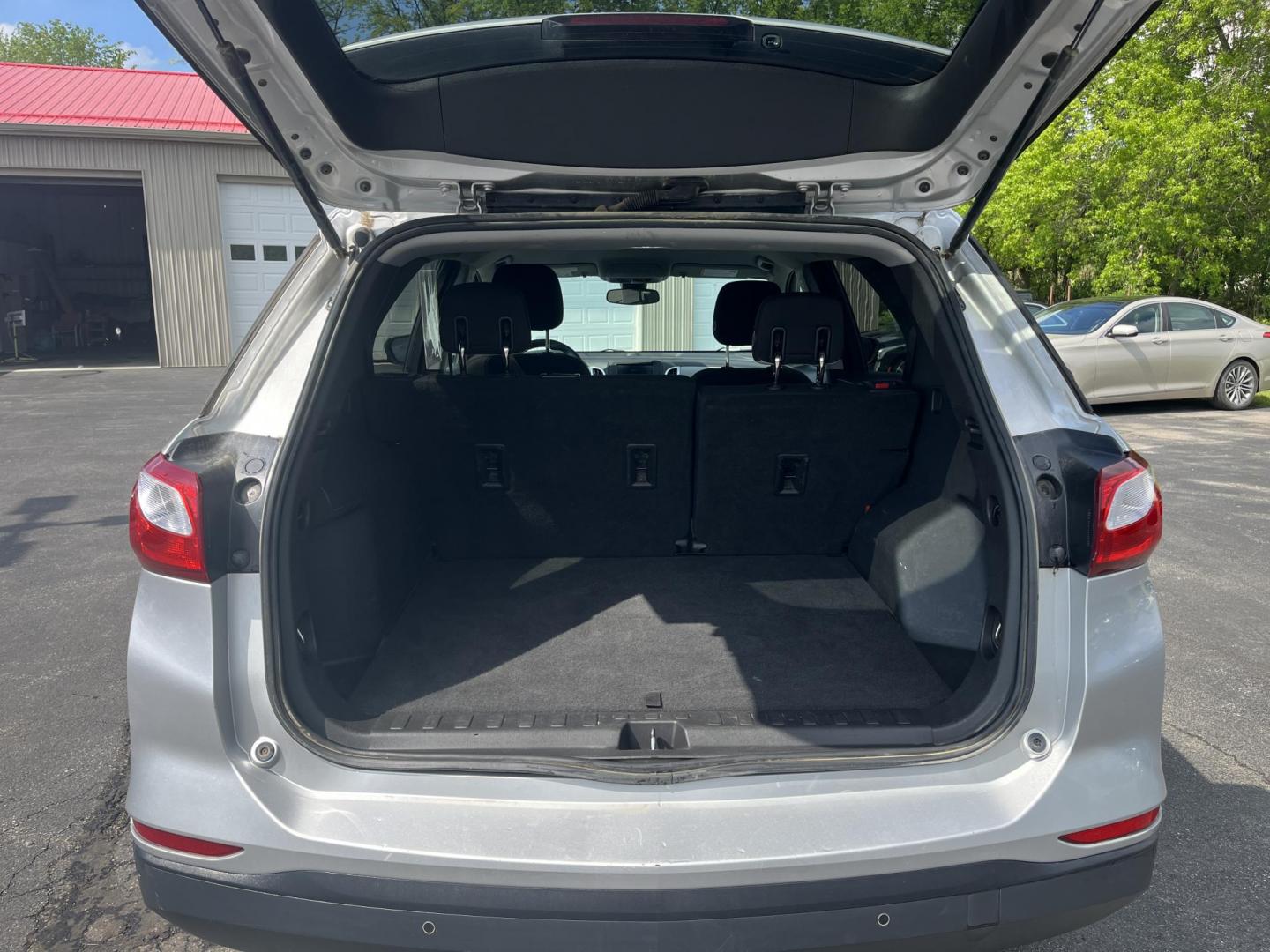 2020 Silver /Black Chevrolet Equinox 1FL AWD (3GNAX5EV2LS) with an 1.5L I4 DOHC 16V TURBO engine, 6A transmission, located at 547 E. Main St., Orwell, OH, 44076, (440) 437-5893, 41.535435, -80.847855 - This One Owner 2020 Chevrolet Equinox 1FL AWD features a turbocharged 1.5L EcoTec engine paired with a 6-speed automatic transmission for efficient performance at 30 MPG highway, while its 7-inch touchscreen supports Apple CarPlay and Android Auto for seamless connectivity; additional highlights inc - Photo#29