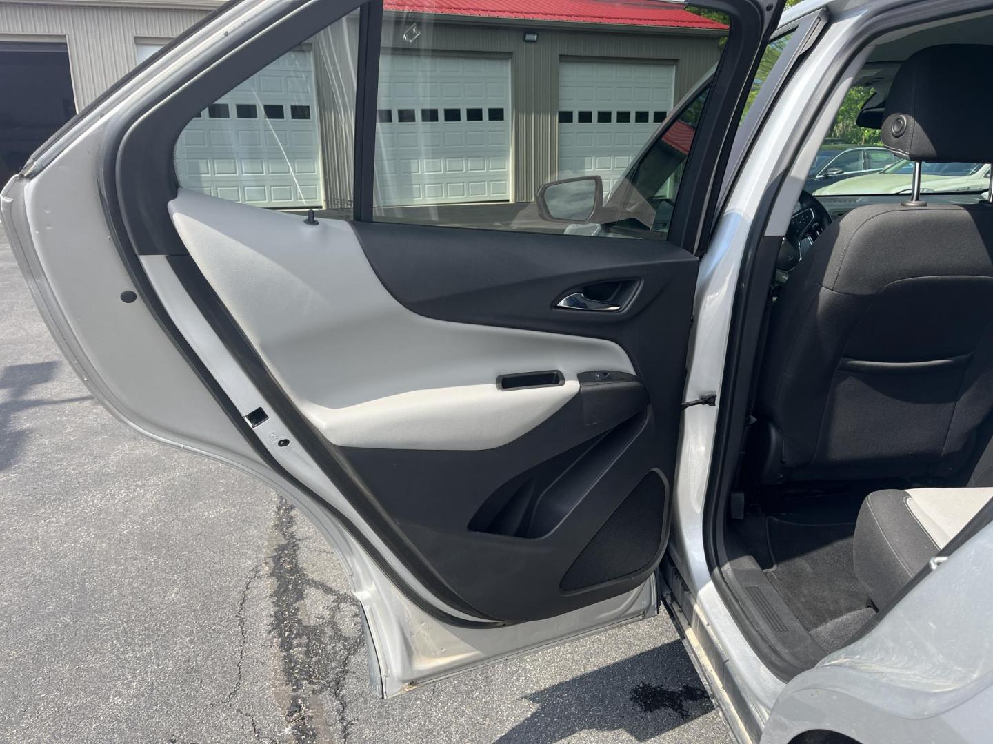 2020 Silver /Black Chevrolet Equinox 1FL AWD (3GNAX5EV2LS) with an 1.5L I4 DOHC 16V TURBO engine, 6A transmission, located at 547 E. Main St., Orwell, OH, 44076, (440) 437-5893, 41.535435, -80.847855 - This One Owner 2020 Chevrolet Equinox 1FL AWD features a turbocharged 1.5L EcoTec engine paired with a 6-speed automatic transmission for efficient performance at 30 MPG highway, while its 7-inch touchscreen supports Apple CarPlay and Android Auto for seamless connectivity; additional highlights inc - Photo#39