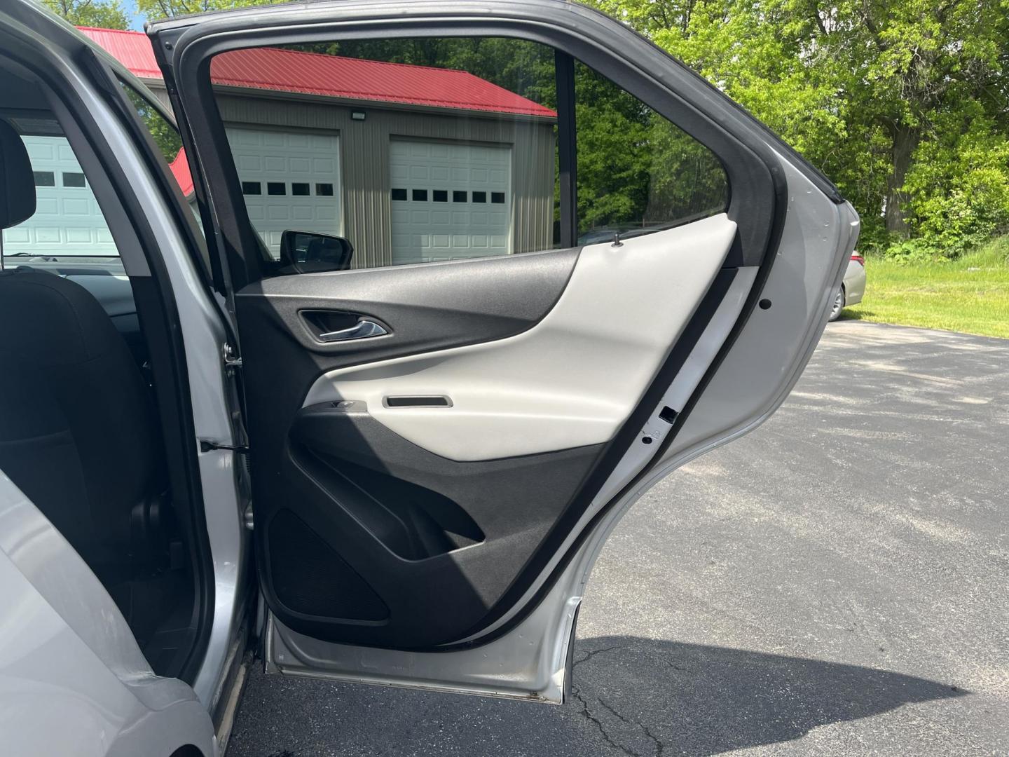 2020 Silver /Black Chevrolet Equinox 1FL AWD (3GNAX5EV2LS) with an 1.5L I4 DOHC 16V TURBO engine, 6A transmission, located at 547 E. Main St., Orwell, OH, 44076, (440) 437-5893, 41.535435, -80.847855 - This One Owner 2020 Chevrolet Equinox 1FL AWD features a turbocharged 1.5L EcoTec engine paired with a 6-speed automatic transmission for efficient performance at 30 MPG highway, while its 7-inch touchscreen supports Apple CarPlay and Android Auto for seamless connectivity; additional highlights inc - Photo#34