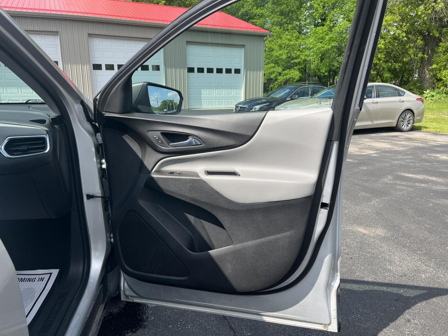 2020 Silver /Black Chevrolet Equinox 1FL AWD (3GNAX5EV2LS) with an 1.5L I4 DOHC 16V TURBO engine, 6A transmission, located at 547 E. Main St., Orwell, OH, 44076, (440) 437-5893, 41.535435, -80.847855 - This One Owner 2020 Chevrolet Equinox 1FL AWD features a turbocharged 1.5L EcoTec engine paired with a 6-speed automatic transmission for efficient performance at 30 MPG highway, while its 7-inch touchscreen supports Apple CarPlay and Android Auto for seamless connectivity; additional highlights inc - Photo#40