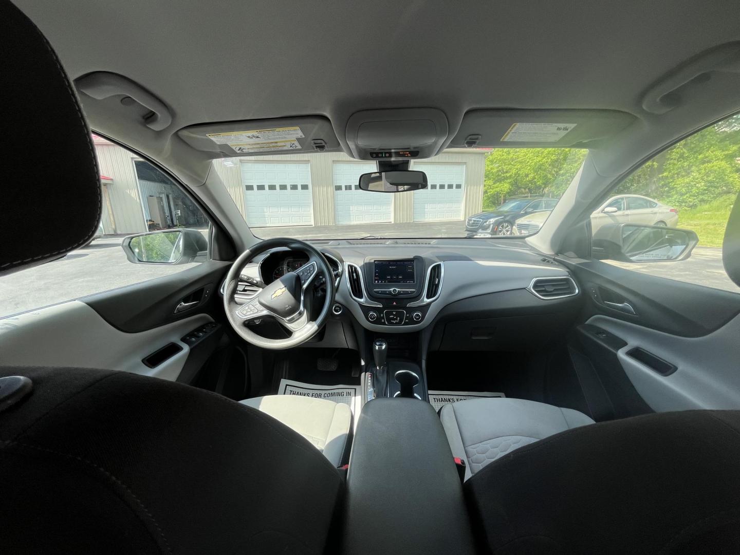 2020 Silver /Black Chevrolet Equinox 1FL AWD (3GNAX5EV2LS) with an 1.5L I4 DOHC 16V TURBO engine, 6A transmission, located at 547 E. Main St., Orwell, OH, 44076, (440) 437-5893, 41.535435, -80.847855 - This One Owner 2020 Chevrolet Equinox 1FL AWD features a turbocharged 1.5L EcoTec engine paired with a 6-speed automatic transmission for efficient performance at 30 MPG highway, while its 7-inch touchscreen supports Apple CarPlay and Android Auto for seamless connectivity; additional highlights inc - Photo#15