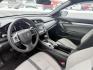 2018 Gray /Black Honda Civic LX Coupe CVT (2HGFC4B51JH) with an 2.0L I4 DOHC 16V engine, Automatic transmission, located at 547 E. Main St., Orwell, OH, 44076, (440) 437-5893, 41.535435, -80.847855 - This 2018 Honda Civic LX Coupe boasts a fuel-efficient 2.0L I4 Earthdreams engine achieving 39 MPG on the highway, and comes well-equipped with modern conveniences like a backup camera and a 5.0-inch center screen, making it a practical and reliable choice. This Honda is fully serviced, comes with a - Photo#4