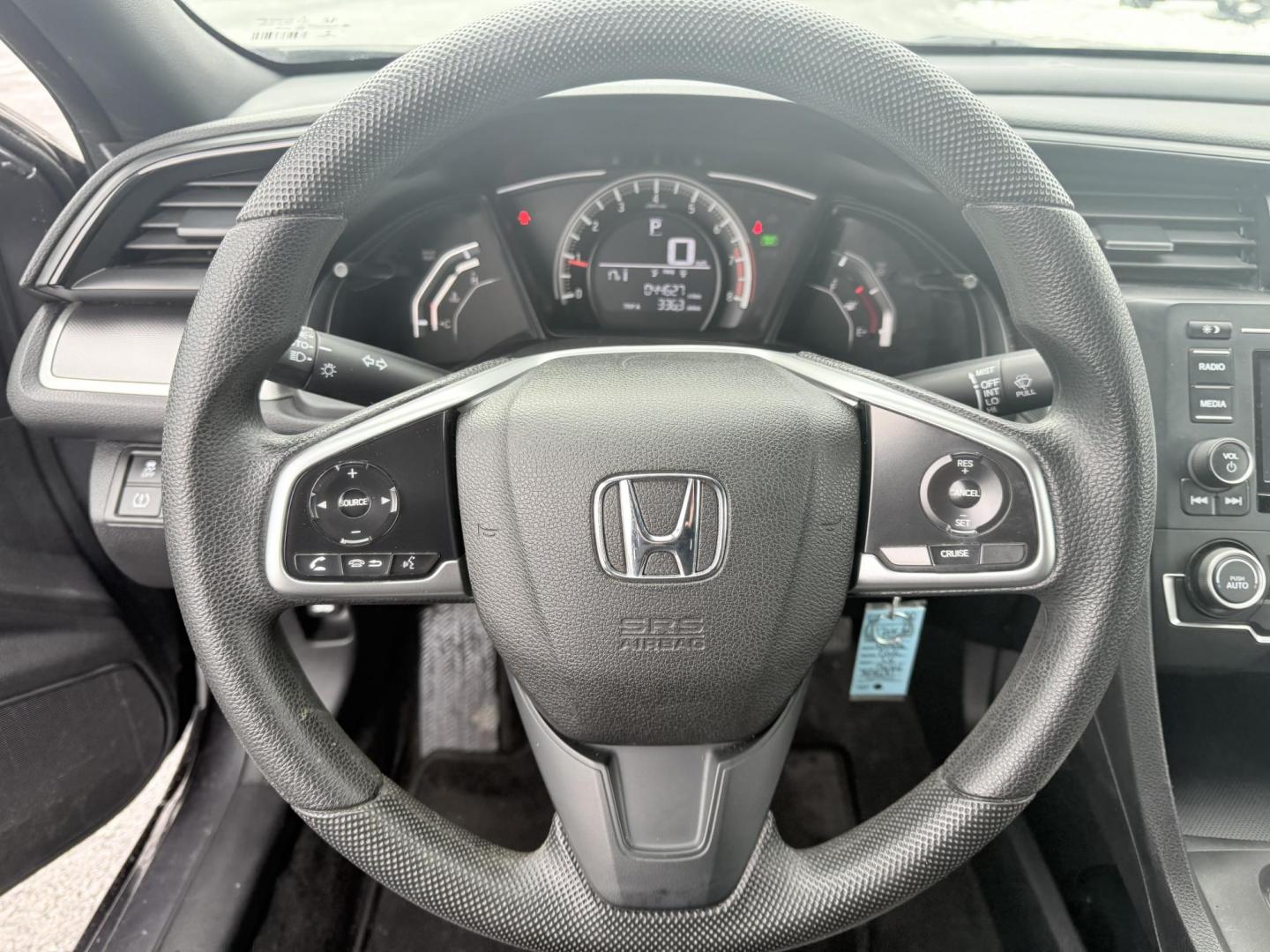 2018 Gray /Black Honda Civic LX Coupe CVT (2HGFC4B51JH) with an 2.0L I4 DOHC 16V engine, Automatic transmission, located at 547 E. Main St., Orwell, OH, 44076, (440) 437-5893, 41.535435, -80.847855 - This 2018 Honda Civic LX Coupe boasts a fuel-efficient 2.0L I4 Earthdreams engine achieving 39 MPG on the highway, and comes well-equipped with modern conveniences like a backup camera and a 5.0-inch center screen, making it a practical and reliable choice. This Honda is fully serviced, comes with a - Photo#10