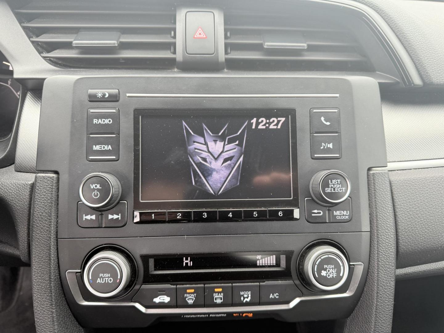 2018 Gray /Black Honda Civic LX Coupe CVT (2HGFC4B51JH) with an 2.0L I4 DOHC 16V engine, Automatic transmission, located at 547 E. Main St., Orwell, OH, 44076, (440) 437-5893, 41.535435, -80.847855 - This 2018 Honda Civic LX Coupe boasts a fuel-efficient 2.0L I4 Earthdreams engine achieving 39 MPG on the highway, and comes well-equipped with modern conveniences like a backup camera and a 5.0-inch center screen, making it a practical and reliable choice. This Honda is fully serviced, comes with a - Photo#12