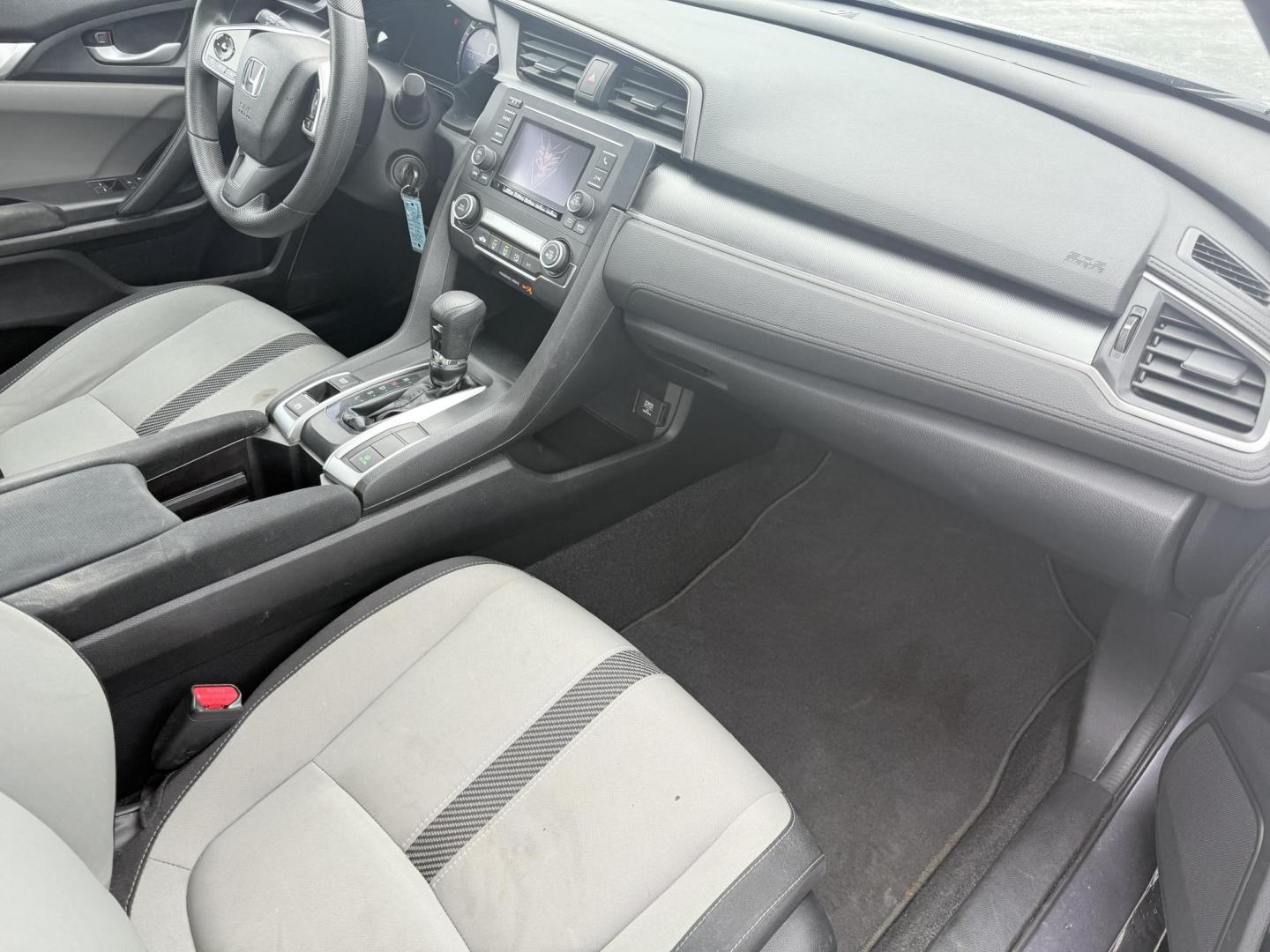 2018 Gray /Black Honda Civic LX Coupe CVT (2HGFC4B51JH) with an 2.0L I4 DOHC 16V engine, Automatic transmission, located at 547 E. Main St., Orwell, OH, 44076, (440) 437-5893, 41.535435, -80.847855 - This 2018 Honda Civic LX Coupe boasts a fuel-efficient 2.0L I4 Earthdreams engine achieving 39 MPG on the highway, and comes well-equipped with modern conveniences like a backup camera and a 5.0-inch center screen, making it a practical and reliable choice. This Honda is fully serviced, comes with a - Photo#29
