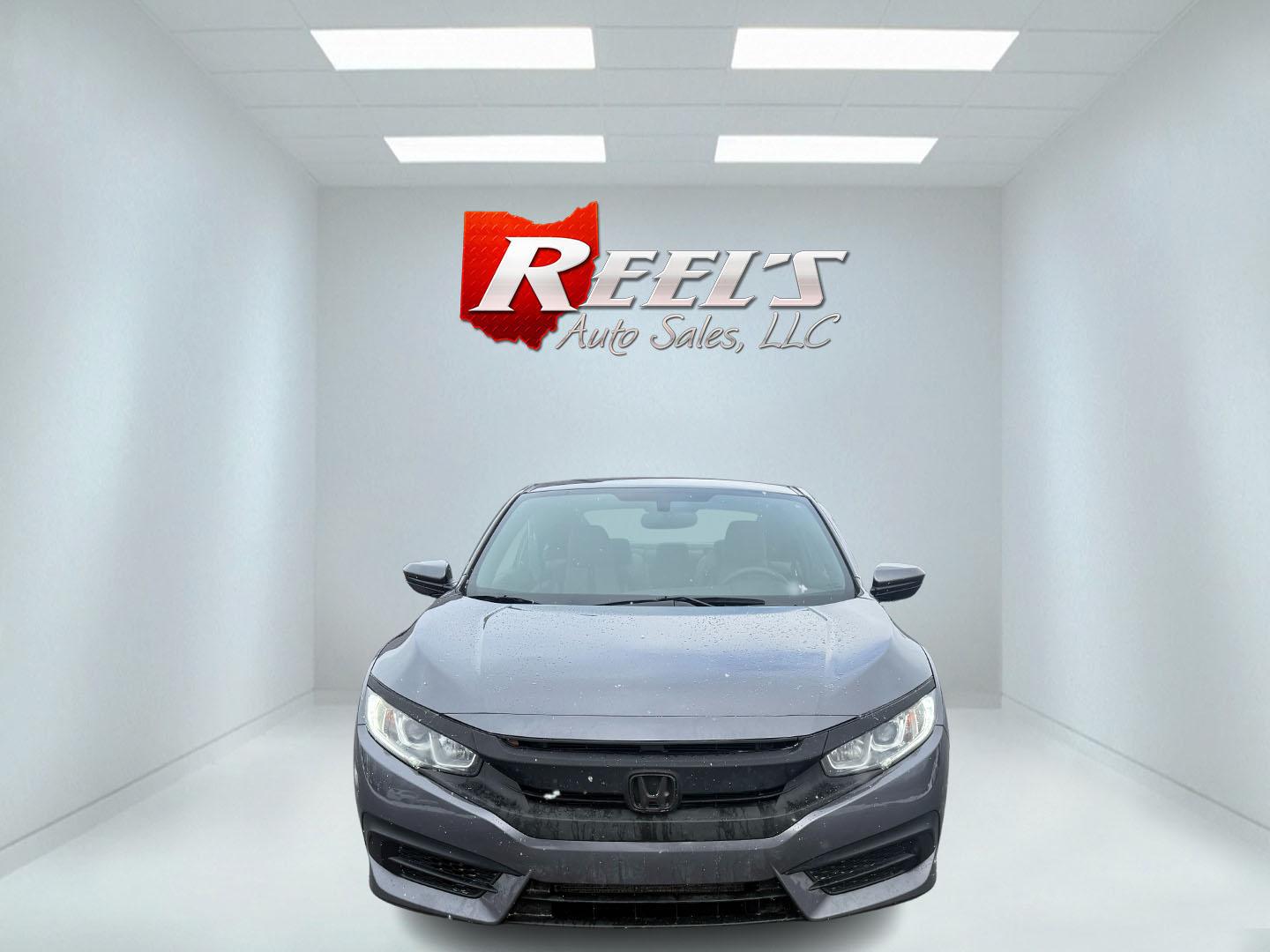 2018 Gray /Black Honda Civic LX Coupe CVT (2HGFC4B51JH) with an 2.0L I4 DOHC 16V engine, Automatic transmission, located at 547 E. Main St., Orwell, OH, 44076, (440) 437-5893, 41.535435, -80.847855 - This 2018 Honda Civic LX Coupe boasts a fuel-efficient 2.0L I4 Earthdreams engine achieving 39 MPG on the highway, and comes well-equipped with modern conveniences like a backup camera and a 5.0-inch center screen, making it a practical and reliable choice. This Honda is fully serviced, comes with a - Photo#1