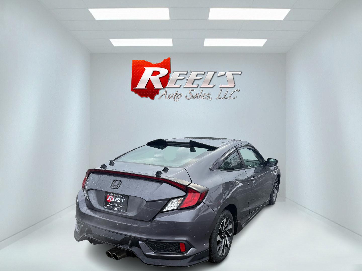 2018 Gray /Black Honda Civic LX Coupe CVT (2HGFC4B51JH) with an 2.0L I4 DOHC 16V engine, Automatic transmission, located at 547 E. Main St., Orwell, OH, 44076, (440) 437-5893, 41.535435, -80.847855 - This 2018 Honda Civic LX Coupe boasts a fuel-efficient 2.0L I4 Earthdreams engine achieving 39 MPG on the highway, and comes well-equipped with modern conveniences like a backup camera and a 5.0-inch center screen, making it a practical and reliable choice. This Honda is fully serviced, comes with a - Photo#20