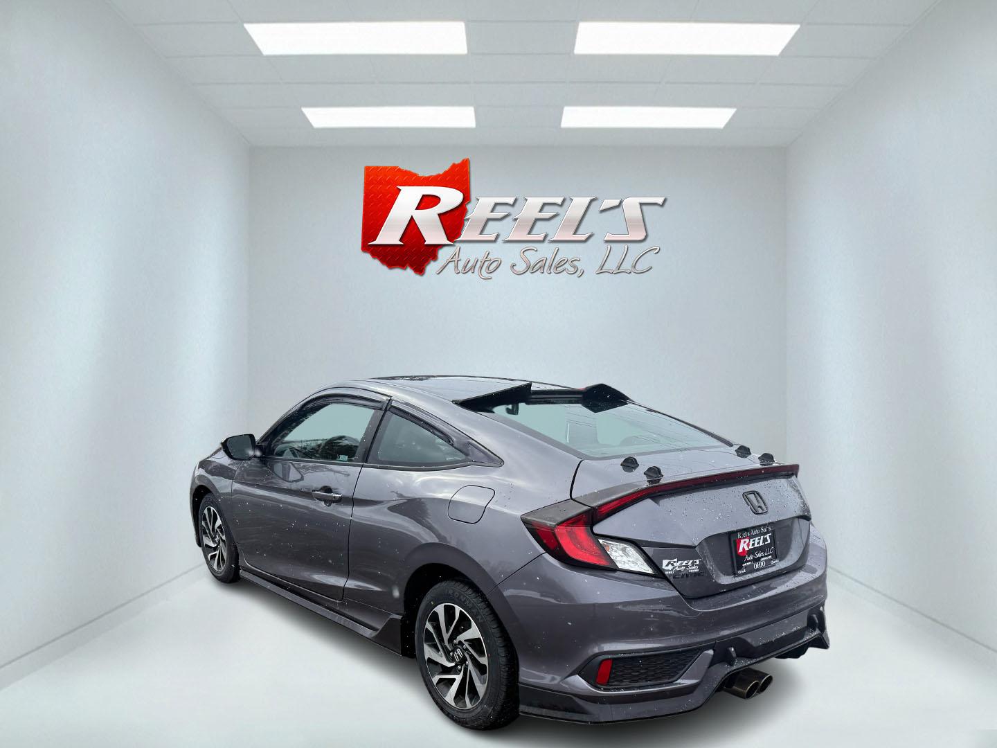 2018 Gray /Black Honda Civic LX Coupe CVT (2HGFC4B51JH) with an 2.0L I4 DOHC 16V engine, Automatic transmission, located at 547 E. Main St., Orwell, OH, 44076, (440) 437-5893, 41.535435, -80.847855 - This 2018 Honda Civic LX Coupe boasts a fuel-efficient 2.0L I4 Earthdreams engine achieving 39 MPG on the highway, and comes well-equipped with modern conveniences like a backup camera and a 5.0-inch center screen, making it a practical and reliable choice. This Honda is fully serviced, comes with a - Photo#23