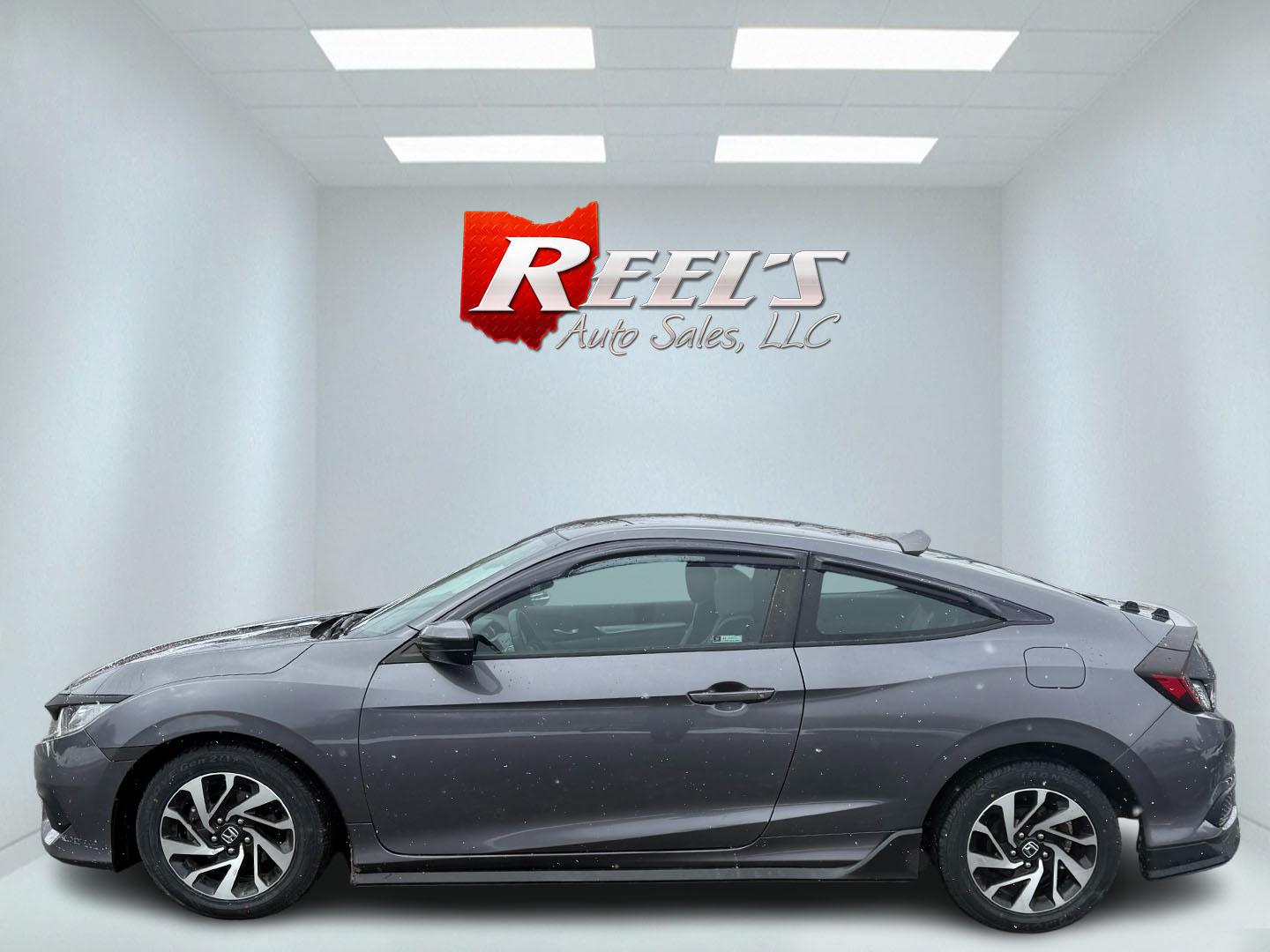 2018 Gray /Black Honda Civic LX Coupe CVT (2HGFC4B51JH) with an 2.0L I4 DOHC 16V engine, Automatic transmission, located at 547 E. Main St., Orwell, OH, 44076, (440) 437-5893, 41.535435, -80.847855 - This 2018 Honda Civic LX Coupe boasts a fuel-efficient 2.0L I4 Earthdreams engine achieving 39 MPG on the highway, and comes well-equipped with modern conveniences like a backup camera and a 5.0-inch center screen, making it a practical and reliable choice. This Honda is fully serviced, comes with a - Photo#26