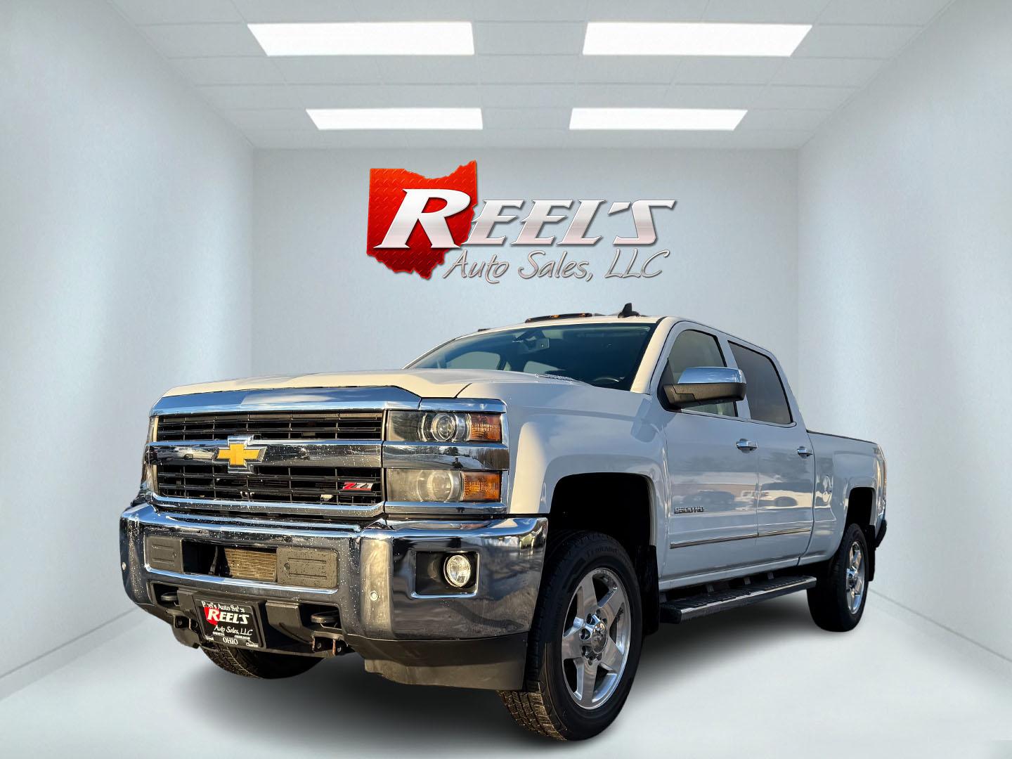 2015 White /Black Chevrolet Silverado 2500HD LTZ Crew Cab Long Box 4WD (1GC1KWE84FF) with an 6.6L V8 OHV 32V TURBO DIESEL engine, 6-Speed Automatic transmission, located at 547 E. Main St., Orwell, OH, 44076, (440) 437-5893, 41.535435, -80.847855 - This One Owner 2015 Chevrolet Silverado 2500 HD is engineered for heavy-duty tasks with its 6.6 Duramax engine producing 397 HP and 765 lb-ft of torque, paired with a 6-speed Allison transmission and 3.73 gearing to deliver a 2,363-pound payload, 14,000-pound towing capacity (5th-wheel), and 13,000 - Photo#0