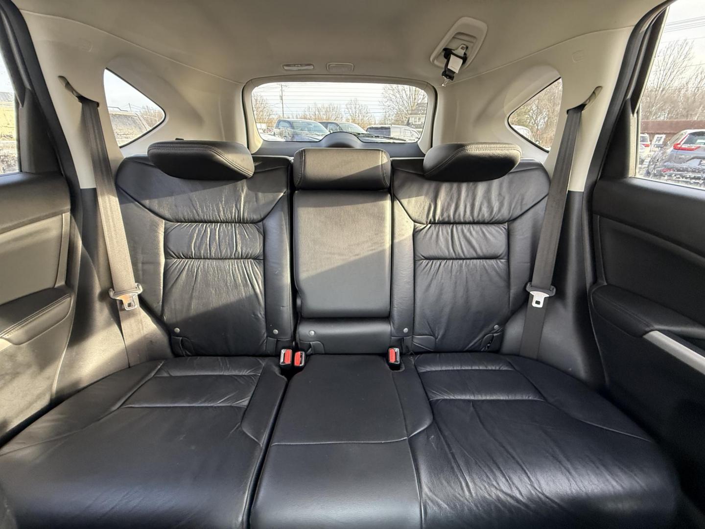 2013 Silver /Black Honda CR-V EX-L 4WD 5-Speed AT (2HKRM4H72DH) with an 2.4L I4 DOHC 16V engine, 5-Speed Automatic transmission, located at 547 E. Main St., Orwell, OH, 44076, (440) 437-5893, 41.535435, -80.847855 - This 2013 Honda CR-V EX-L AWD combines practicality with luxury amenities, making it an appealing option for those seeking comfort and performance. Powered by a 2.4-liter I4 engine paired with a 5-speed automatic transmission, it provides a reliable and smooth driving experience. This model features - Photo#28