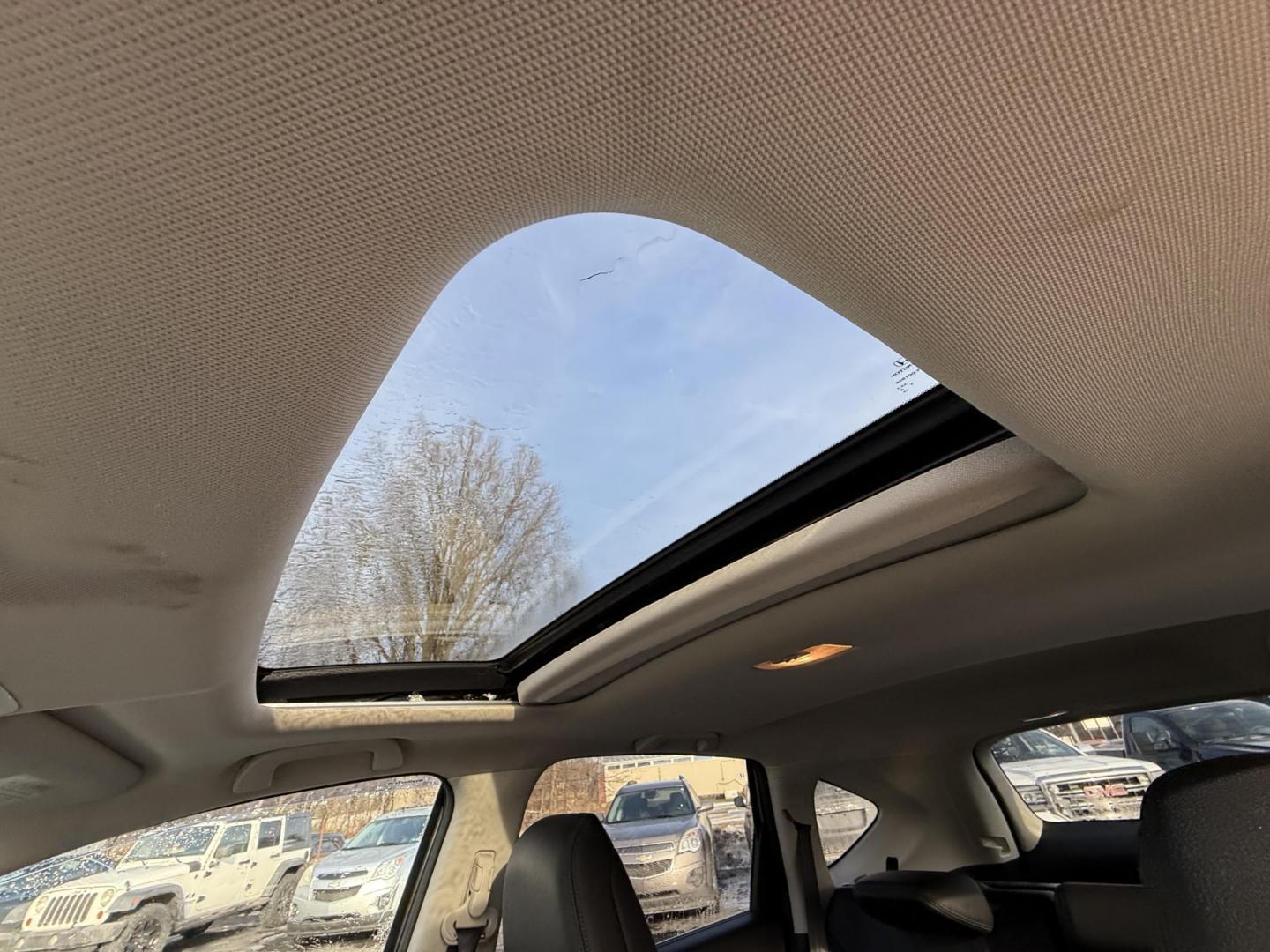 2013 Silver /Black Honda CR-V EX-L 4WD 5-Speed AT (2HKRM4H72DH) with an 2.4L I4 DOHC 16V engine, 5-Speed Automatic transmission, located at 547 E. Main St., Orwell, OH, 44076, (440) 437-5893, 41.535435, -80.847855 - This 2013 Honda CR-V EX-L AWD combines practicality with luxury amenities, making it an appealing option for those seeking comfort and performance. Powered by a 2.4-liter I4 engine paired with a 5-speed automatic transmission, it provides a reliable and smooth driving experience. This model features - Photo#29