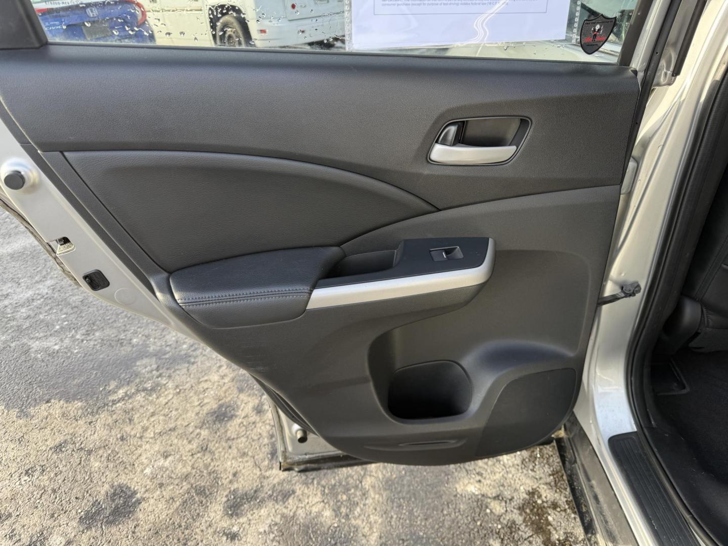2013 Silver /Black Honda CR-V EX-L 4WD 5-Speed AT (2HKRM4H72DH) with an 2.4L I4 DOHC 16V engine, 5-Speed Automatic transmission, located at 547 E. Main St., Orwell, OH, 44076, (440) 437-5893, 41.535435, -80.847855 - This 2013 Honda CR-V EX-L AWD combines practicality with luxury amenities, making it an appealing option for those seeking comfort and performance. Powered by a 2.4-liter I4 engine paired with a 5-speed automatic transmission, it provides a reliable and smooth driving experience. This model features - Photo#31