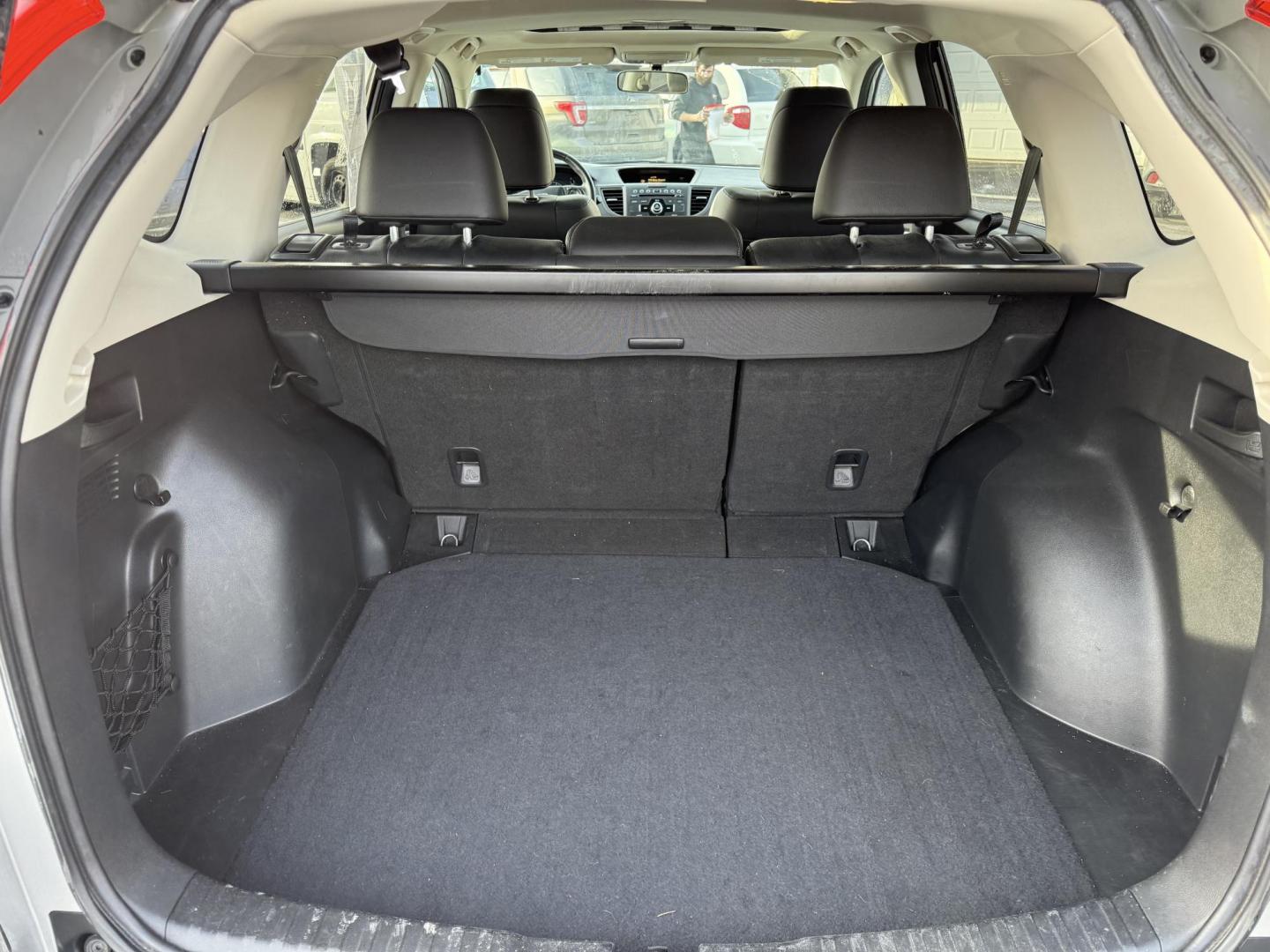 2013 Silver /Black Honda CR-V EX-L 4WD 5-Speed AT (2HKRM4H72DH) with an 2.4L I4 DOHC 16V engine, 5-Speed Automatic transmission, located at 547 E. Main St., Orwell, OH, 44076, (440) 437-5893, 41.535435, -80.847855 - This 2013 Honda CR-V EX-L AWD combines practicality with luxury amenities, making it an appealing option for those seeking comfort and performance. Powered by a 2.4-liter I4 engine paired with a 5-speed automatic transmission, it provides a reliable and smooth driving experience. This model features - Photo#33
