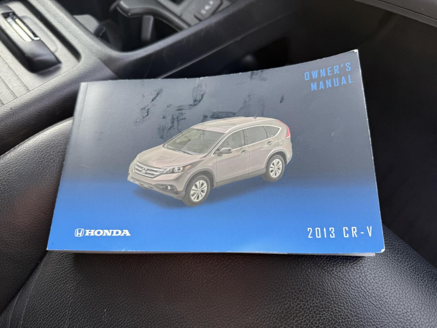 2013 Silver /Black Honda CR-V EX-L 4WD 5-Speed AT (2HKRM4H72DH) with an 2.4L I4 DOHC 16V engine, 5-Speed Automatic transmission, located at 547 E. Main St., Orwell, OH, 44076, (440) 437-5893, 41.535435, -80.847855 - This 2013 Honda CR-V EX-L AWD combines practicality with luxury amenities, making it an appealing option for those seeking comfort and performance. Powered by a 2.4-liter I4 engine paired with a 5-speed automatic transmission, it provides a reliable and smooth driving experience. This model features - Photo#38