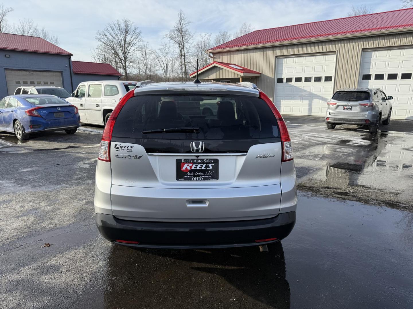 2013 Silver /Black Honda CR-V EX-L 4WD 5-Speed AT (2HKRM4H72DH) with an 2.4L I4 DOHC 16V engine, 5-Speed Automatic transmission, located at 547 E. Main St., Orwell, OH, 44076, (440) 437-5893, 41.535435, -80.847855 - This 2013 Honda CR-V EX-L AWD combines practicality with luxury amenities, making it an appealing option for those seeking comfort and performance. Powered by a 2.4-liter I4 engine paired with a 5-speed automatic transmission, it provides a reliable and smooth driving experience. This model features - Photo#7