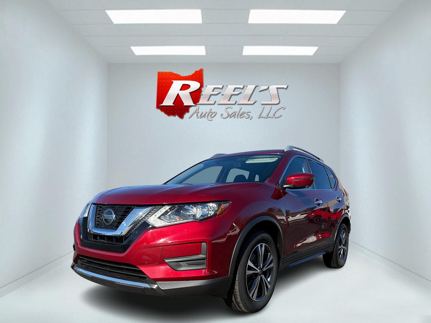 2020 Red /Black Nissan Rogue SV AWD (5N1AT2MV4LC) with an 2.5L I4 DOHC 16V engine, Automatic transmission, located at 547 E. Main St., Orwell, OH, 44076, (440) 437-5893, 41.535435, -80.847855 - This 2020 Nissan Rogue SV AWD offers a balanced blend of features for comfort and efficiency. Its 2.4-liter I4 engine is paired with ECO and Sport modes, allowing drivers to choose between fuel efficiency and enhanced performance, achieving around 32 MPG on the highway. The vehicle is equipped with - Photo#0