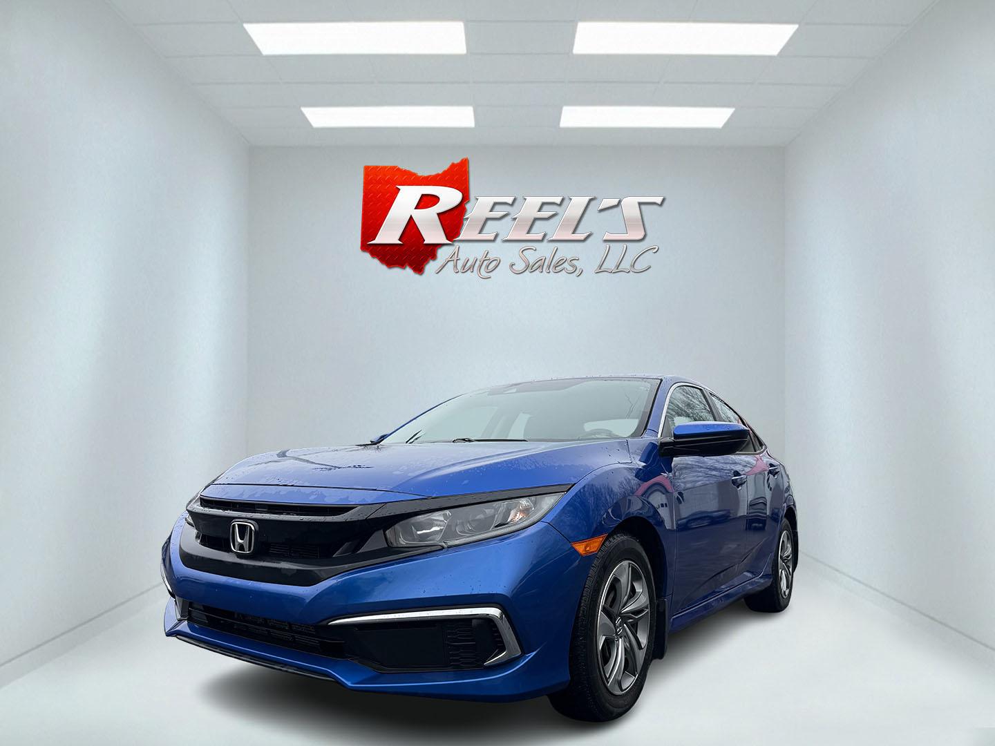 2019 Blue /Black Honda Civic LX Honda Sensing Sedan CVT (2HGFC2F65KH) with an 2.0L I4 DOHC 16V engine, Automatic transmission, located at 11115 Chardon Rd. , Chardon, OH, 44024, (440) 214-9705, 41.580246, -81.241943 - Photo#0