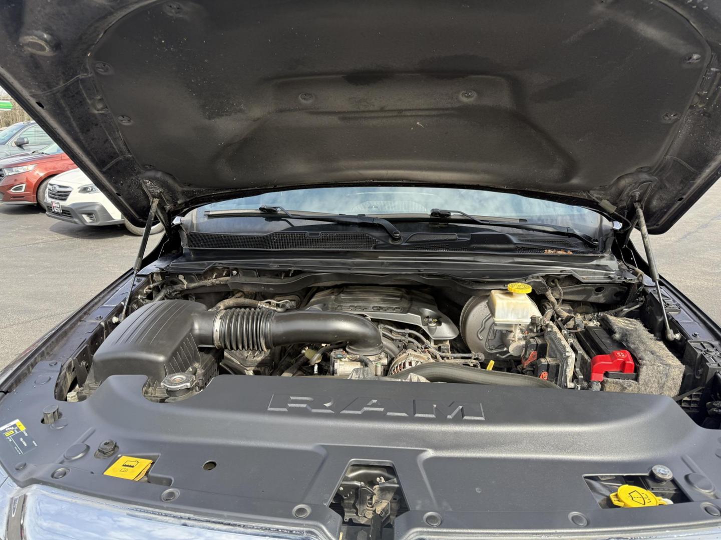 2019 Gray /Black RAM 1500 Big Horn Crew Cab SWB 4WD (1C6SRFFTXKN) with an 5.7L V8 OHV 16V engine, 8A transmission, located at 11115 Chardon Rd. , Chardon, OH, 44024, (440) 214-9705, 41.580246, -81.241943 - This 2019 Ram 1500 Big Horn Crew Cab is a well-equipped truck combining powerful performance with modern technology and comfort features. It comes with a 5.7 HEMI V8 engine delivering 395 HP and 410 lb-ft of torque, paired with an 8-speed automatic transmission and 3.21 gearing, boasting an 8,120-po - Photo#3