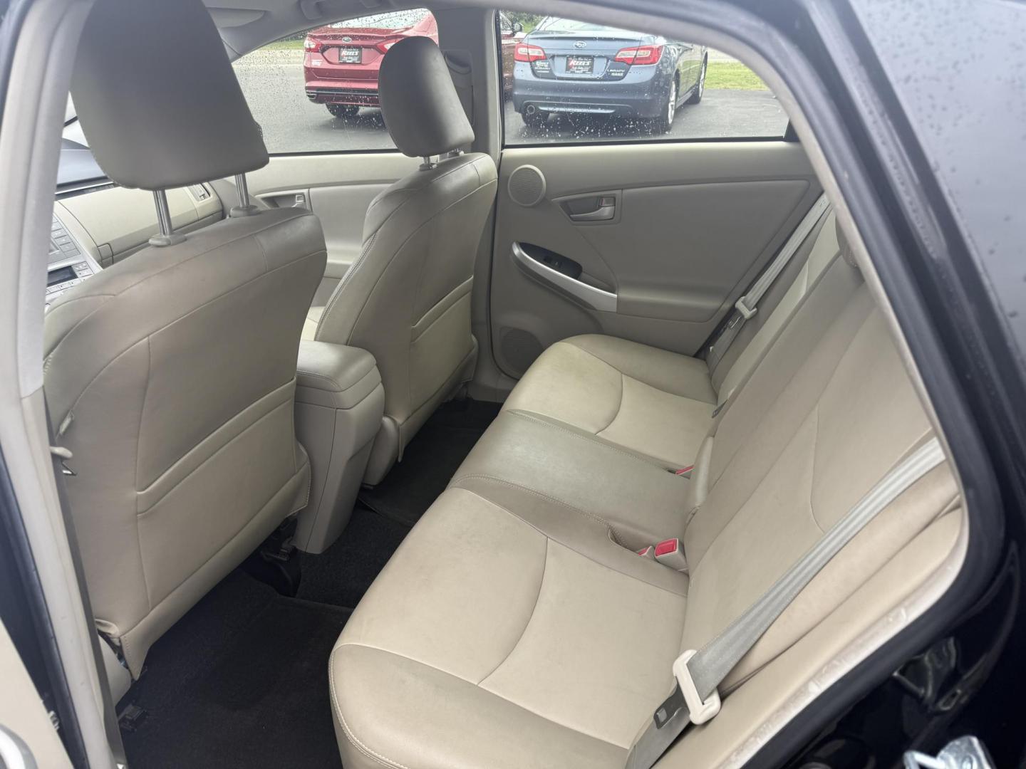 2015 Black /Brown Toyota Prius Four (JTDKN3DU9F1) with an 1.8L I4 DOHC 16V HYBRID engine, Automatic transmission, located at 11115 Chardon Rd. , Chardon, OH, 44024, (440) 214-9705, 41.580246, -81.241943 - This 2015 Toyota Prius Four is a desirable trim level for those seeking both efficiency and luxury features. It boasts a leather interior and heated front seats, providing comfort and a premium feel. The vehicle's technology includes a 6.1-inch touchscreen, which facilitates access to its navigation - Photo#24