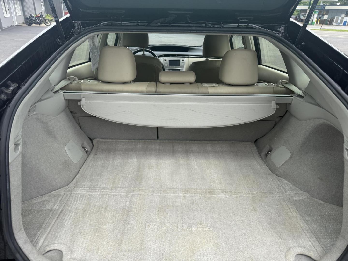 2015 Black /Brown Toyota Prius Four (JTDKN3DU9F1) with an 1.8L I4 DOHC 16V HYBRID engine, Automatic transmission, located at 11115 Chardon Rd. , Chardon, OH, 44024, (440) 214-9705, 41.580246, -81.241943 - This 2015 Toyota Prius Four is a desirable trim level for those seeking both efficiency and luxury features. It boasts a leather interior and heated front seats, providing comfort and a premium feel. The vehicle's technology includes a 6.1-inch touchscreen, which facilitates access to its navigation - Photo#10