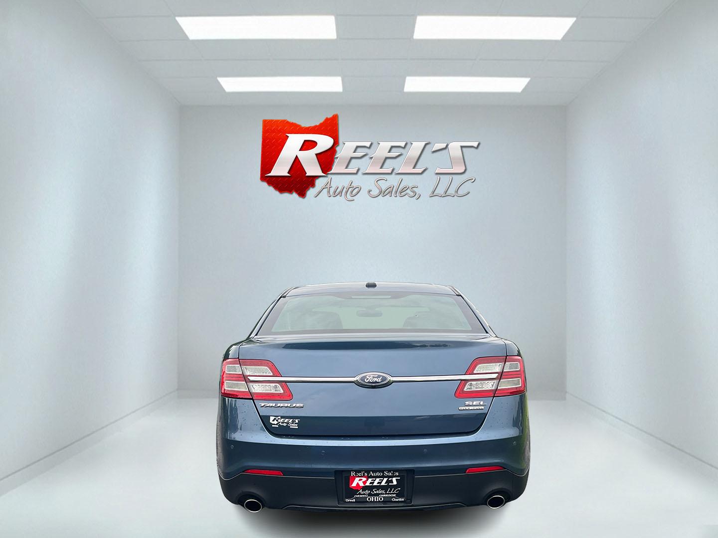2018 Blue /Black Ford Taurus SEL FWD (1FAHP2E86JG) with an 3.5L V6 DOHC 24V engine, 6A transmission, located at 11115 Chardon Rd. , Chardon, OH, 44024, (440) 214-9705, 41.580246, -81.241943 - This One Owner 2018 Ford Taurus SEL offers a comfortable drive with its 3.5-liter V6 engine and 6-speed automatic transmission, delivering a balanced mix of power and efficiency, achieving up to 27 MPG on the highway. Its design provides practicality and comfort, featuring a leather interior with po - Photo#43