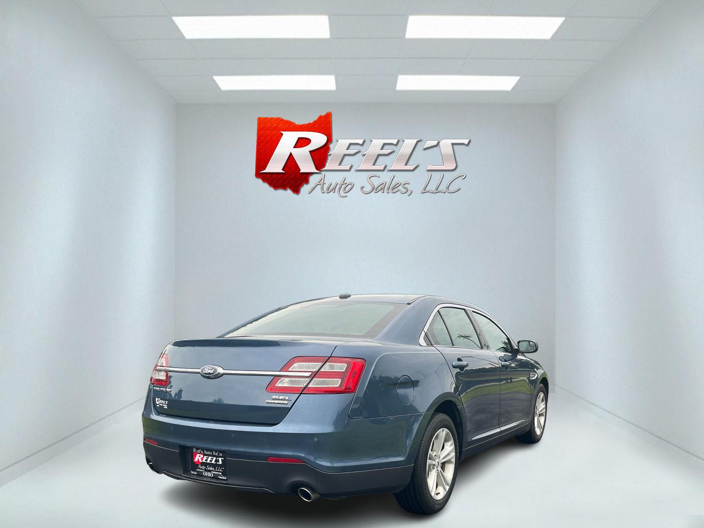 2018 Blue /Black Ford Taurus SEL FWD (1FAHP2E86JG) with an 3.5L V6 DOHC 24V engine, 6A transmission, located at 11115 Chardon Rd. , Chardon, OH, 44024, (440) 214-9705, 41.580246, -81.241943 - This One Owner 2018 Ford Taurus SEL offers a comfortable drive with its 3.5-liter V6 engine and 6-speed automatic transmission, delivering a balanced mix of power and efficiency, achieving up to 27 MPG on the highway. Its design provides practicality and comfort, featuring a leather interior with po - Photo#44