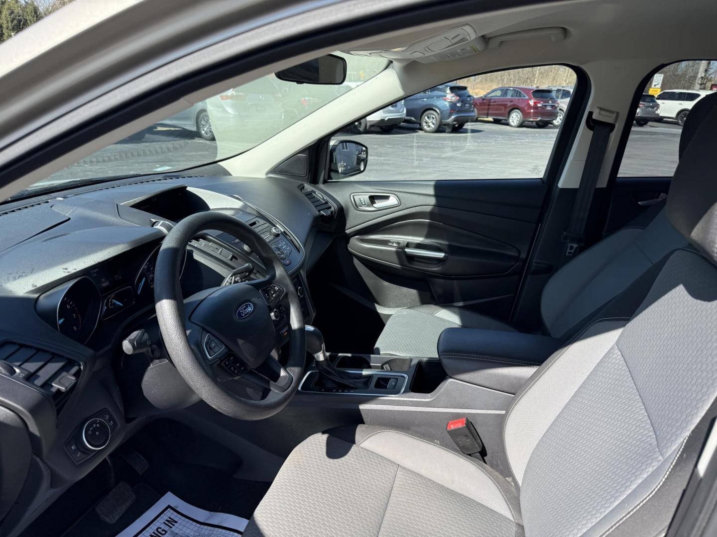 2017 Gold /Black Ford Escape SE 4WD (1FMCU9GD9HU) with an 1.5L I4 DOHC 16V Turbo engine, 6A transmission, located at 11115 Chardon Rd. , Chardon, OH, 44024, (440) 214-9705, 41.580246, -81.241943 - This One Owner 2017 Ford Escape SE 4WD is a versatile compact SUV equipped with a 1.5L I4 EcoBoost engine and a 6-speed automatic transmission, providing an efficient and smooth driving experience with 28 MPG on the highway. It features a power driver's seat for personalized comfort and a backup cam - Photo#15