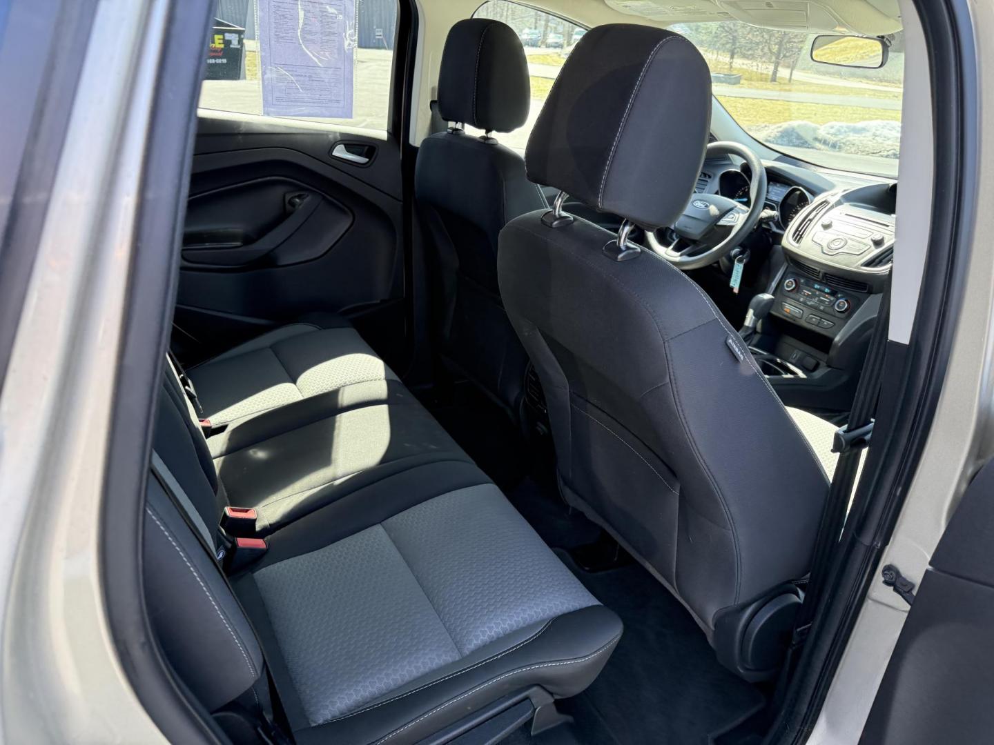 2017 Gold /Black Ford Escape SE 4WD (1FMCU9GD9HU) with an 1.5L I4 DOHC 16V Turbo engine, 6A transmission, located at 11115 Chardon Rd. , Chardon, OH, 44024, (440) 214-9705, 41.580246, -81.241943 - This One Owner 2017 Ford Escape SE 4WD is a versatile compact SUV equipped with a 1.5L I4 EcoBoost engine and a 6-speed automatic transmission, providing an efficient and smooth driving experience with 28 MPG on the highway. It features a power driver's seat for personalized comfort and a backup cam - Photo#31