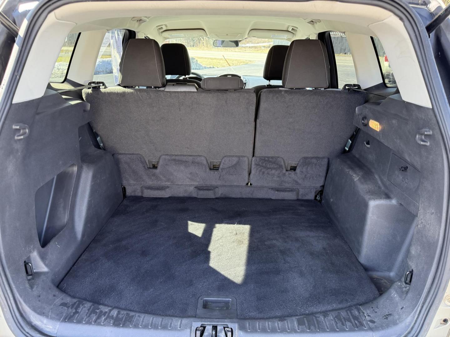 2017 Gold /Black Ford Escape SE 4WD (1FMCU9GD9HU) with an 1.5L I4 DOHC 16V Turbo engine, 6A transmission, located at 11115 Chardon Rd. , Chardon, OH, 44024, (440) 214-9705, 41.580246, -81.241943 - This One Owner 2017 Ford Escape SE 4WD is a versatile compact SUV equipped with a 1.5L I4 EcoBoost engine and a 6-speed automatic transmission, providing an efficient and smooth driving experience with 28 MPG on the highway. It features a power driver's seat for personalized comfort and a backup cam - Photo#33