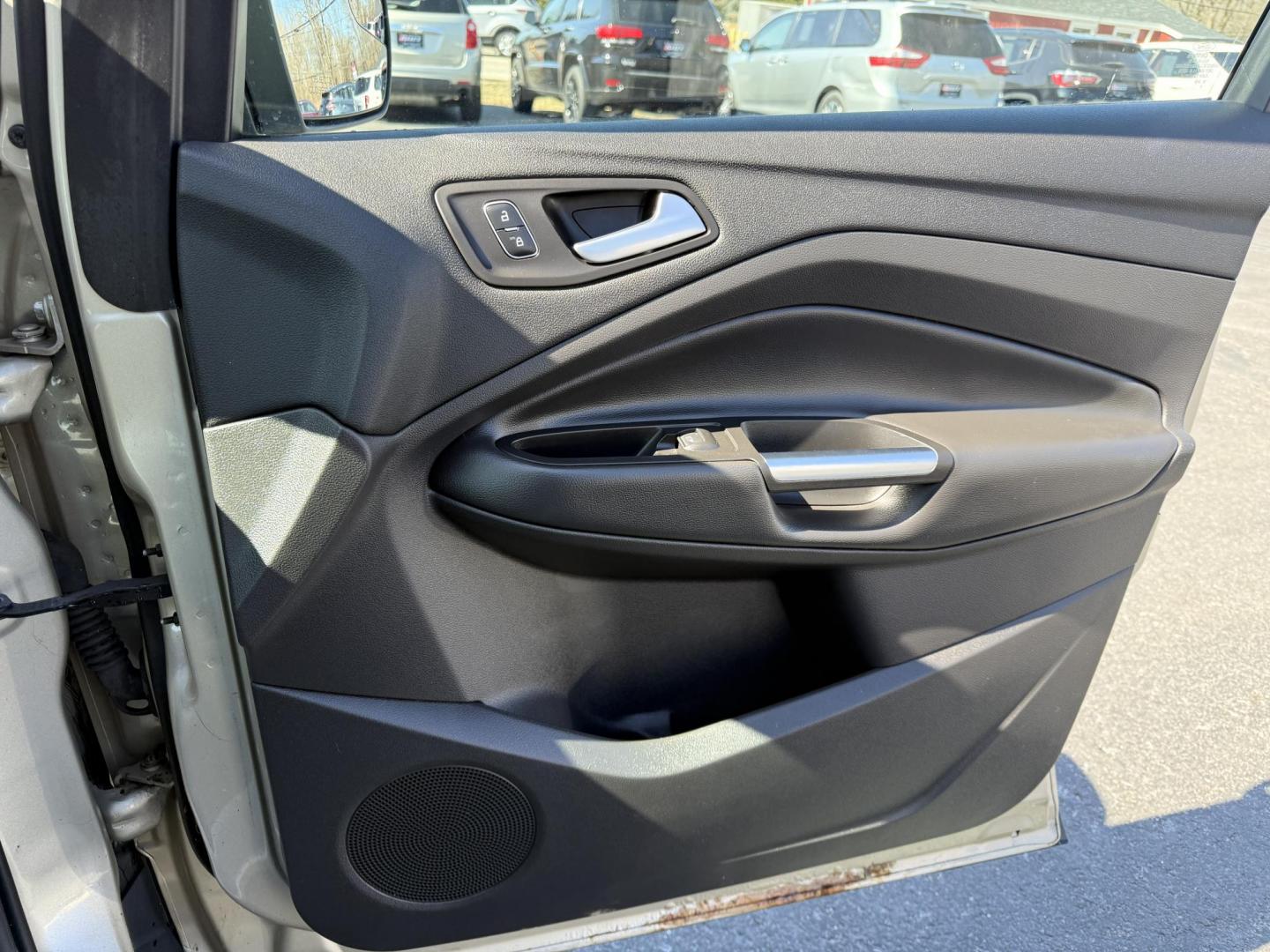 2017 Gold /Black Ford Escape SE 4WD (1FMCU9GD9HU) with an 1.5L I4 DOHC 16V Turbo engine, 6A transmission, located at 11115 Chardon Rd. , Chardon, OH, 44024, (440) 214-9705, 41.580246, -81.241943 - This One Owner 2017 Ford Escape SE 4WD is a versatile compact SUV equipped with a 1.5L I4 EcoBoost engine and a 6-speed automatic transmission, providing an efficient and smooth driving experience with 28 MPG on the highway. It features a power driver's seat for personalized comfort and a backup cam - Photo#38