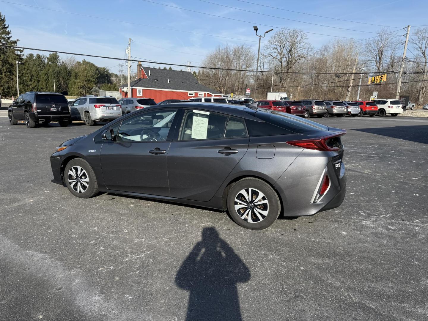 2017 Gray /Gray Toyota Prius Prime Plus (JTDKARFP0H3) with an 1.8L I4 DOHC 16V HYBRID engine, Automatic transmission, located at 11115 Chardon Rd. , Chardon, OH, 44024, (440) 214-9705, 41.580246, -81.241943 - Photo#11