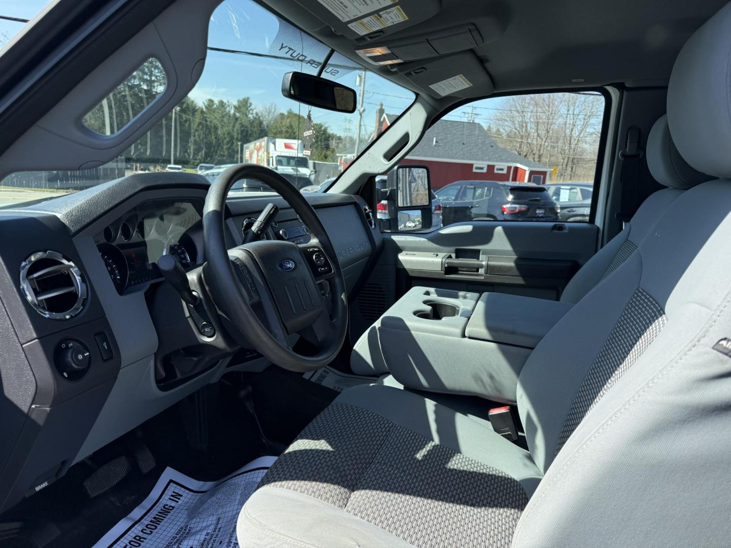 2014 White /Gray Ford F-250 SD XLT SuperCab 4WD (1FT7X2B62EE) with an 6.2L V8 OHV 16V FFV engine, 6-Speed Automatic transmission, located at 11115 Chardon Rd. , Chardon, OH, 44024, (440) 214-9705, 41.580246, -81.241943 - This One Owner 2014 Ford F-250 XLT Supercab is a robust truck designed for both work and comfort, featuring a powerful 6.2-liter V8 engine capable of using flex fuel. It comes with a 6-speed automatic transmission and offers a significant towing capacity of 12,500 pounds along with a payload capacit - Photo#7