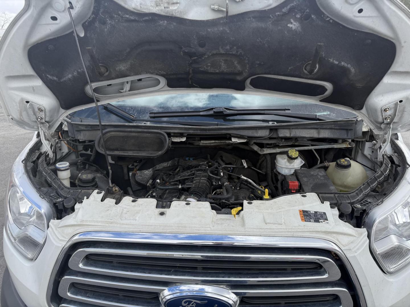 2018 White /Gray Ford Transit 350 Wagon Low Roof XLT w/Sliding Pass. 148-in. WB (1FBZX2YG3JK) with an 3.5L V6 DOHC 24V TWIN TURBO engine, 6A transmission, located at 547 E. Main St., Orwell, OH, 44076, (440) 437-5893, 41.535435, -80.847855 - With room for 15 people, a roof rack, and a tow hitch this Transit is ready to haul just about anything to the job site. Equipped with a robust 3.5L Twin Turbo EcoBoost V6 engine paired with a 6-speed automatic transmission that delivers an estimated 18 MPG on the highway; it features seating for 15 - Photo#3