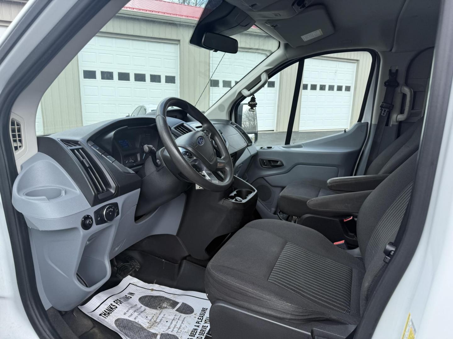 2018 White /Gray Ford Transit 350 Wagon Low Roof XLT w/Sliding Pass. 148-in. WB (1FBZX2YG3JK) with an 3.5L V6 DOHC 24V TWIN TURBO engine, 6A transmission, located at 547 E. Main St., Orwell, OH, 44076, (440) 437-5893, 41.535435, -80.847855 - With room for 15 people, a roof rack, and a tow hitch this Transit is ready to haul just about anything to the job site. Equipped with a robust 3.5L Twin Turbo EcoBoost V6 engine paired with a 6-speed automatic transmission that delivers an estimated 18 MPG on the highway; it features seating for 15 - Photo#11
