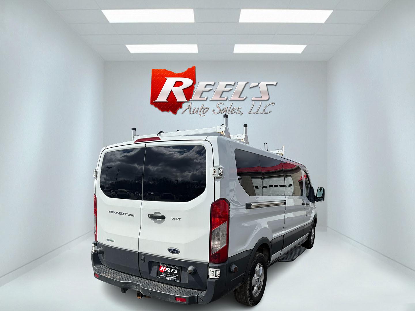 2018 White /Gray Ford Transit 350 Wagon Low Roof XLT w/Sliding Pass. 148-in. WB (1FBZX2YG3JK) with an 3.5L V6 DOHC 24V TWIN TURBO engine, 6A transmission, located at 547 E. Main St., Orwell, OH, 44076, (440) 437-5893, 41.535435, -80.847855 - With room for 15 people, a roof rack, and a tow hitch this Transit is ready to haul just about anything to the job site. Equipped with a robust 3.5L Twin Turbo EcoBoost V6 engine paired with a 6-speed automatic transmission that delivers an estimated 18 MPG on the highway; it features seating for 15 - Photo#33