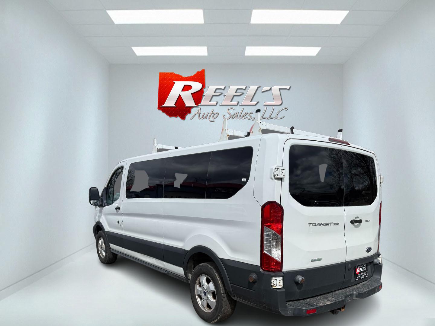 2018 White /Gray Ford Transit 350 Wagon Low Roof XLT w/Sliding Pass. 148-in. WB (1FBZX2YG3JK) with an 3.5L V6 DOHC 24V TWIN TURBO engine, 6A transmission, located at 547 E. Main St., Orwell, OH, 44076, (440) 437-5893, 41.535435, -80.847855 - With room for 15 people, a roof rack, and a tow hitch this Transit is ready to haul just about anything to the job site. Equipped with a robust 3.5L Twin Turbo EcoBoost V6 engine paired with a 6-speed automatic transmission that delivers an estimated 18 MPG on the highway; it features seating for 15 - Photo#35