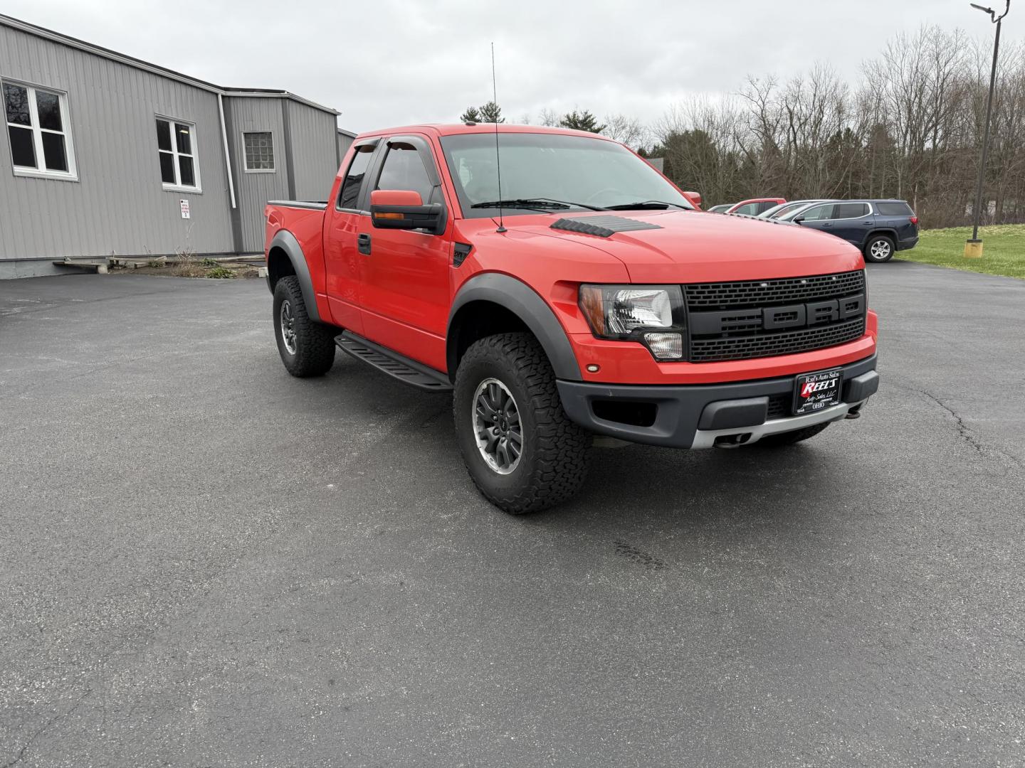 2010 Orange /Black Ford F-150 SVT Raptor SuperCab 6.5-ft. Bed 4WD (1FTEX1E61AF) with an 6.2L V8 SOHC 16V engine, 6-Speed Automatic transmission, located at 11115 Chardon Rd. , Chardon, OH, 44024, (440) 214-9705, 41.580246, -81.241943 - Come take a look at the most desirable Raptor money can buy. This high performance pickup is powered by a 6.2-liter V8 engine producing 400 horsepower and paired with a 6-speed automatic transmission. It features premium leather seats with heated front options, a backup camera for enhanced visibilit - Photo#2