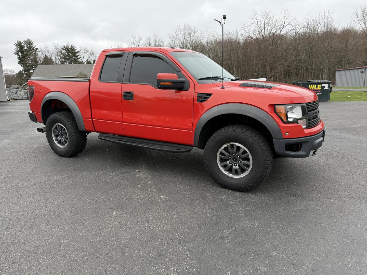 2010 Orange /Black Ford F-150 SVT Raptor SuperCab 6.5-ft. Bed 4WD (1FTEX1E61AF) with an 6.2L V8 SOHC 16V engine, 6-Speed Automatic transmission, located at 11115 Chardon Rd. , Chardon, OH, 44024, (440) 214-9705, 41.580246, -81.241943 - Come take a look at the most desirable Raptor money can buy. This high performance pickup is powered by a 6.2-liter V8 engine producing 400 horsepower and paired with a 6-speed automatic transmission. It features premium leather seats with heated front options, a backup camera for enhanced visibilit - Photo#3