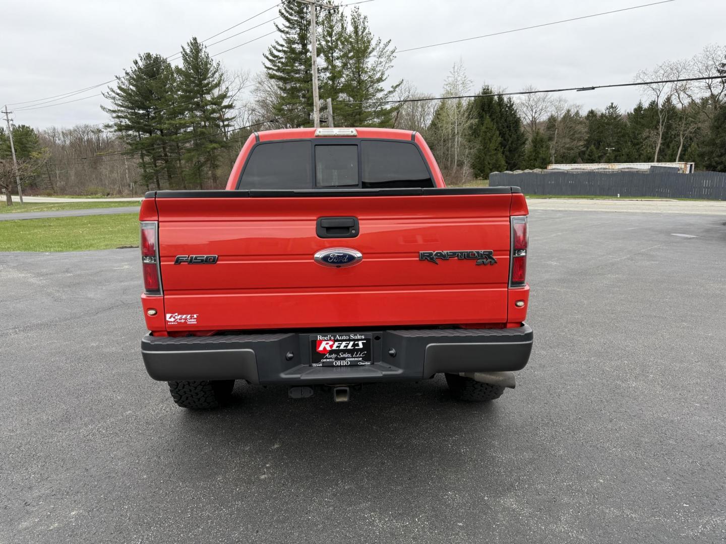 2010 Orange /Black Ford F-150 SVT Raptor SuperCab 6.5-ft. Bed 4WD (1FTEX1E61AF) with an 6.2L V8 SOHC 16V engine, 6-Speed Automatic transmission, located at 11115 Chardon Rd. , Chardon, OH, 44024, (440) 214-9705, 41.580246, -81.241943 - Come take a look at the most desirable Raptor money can buy. This high performance pickup is powered by a 6.2-liter V8 engine producing 400 horsepower and paired with a 6-speed automatic transmission. It features premium leather seats with heated front options, a backup camera for enhanced visibilit - Photo#8