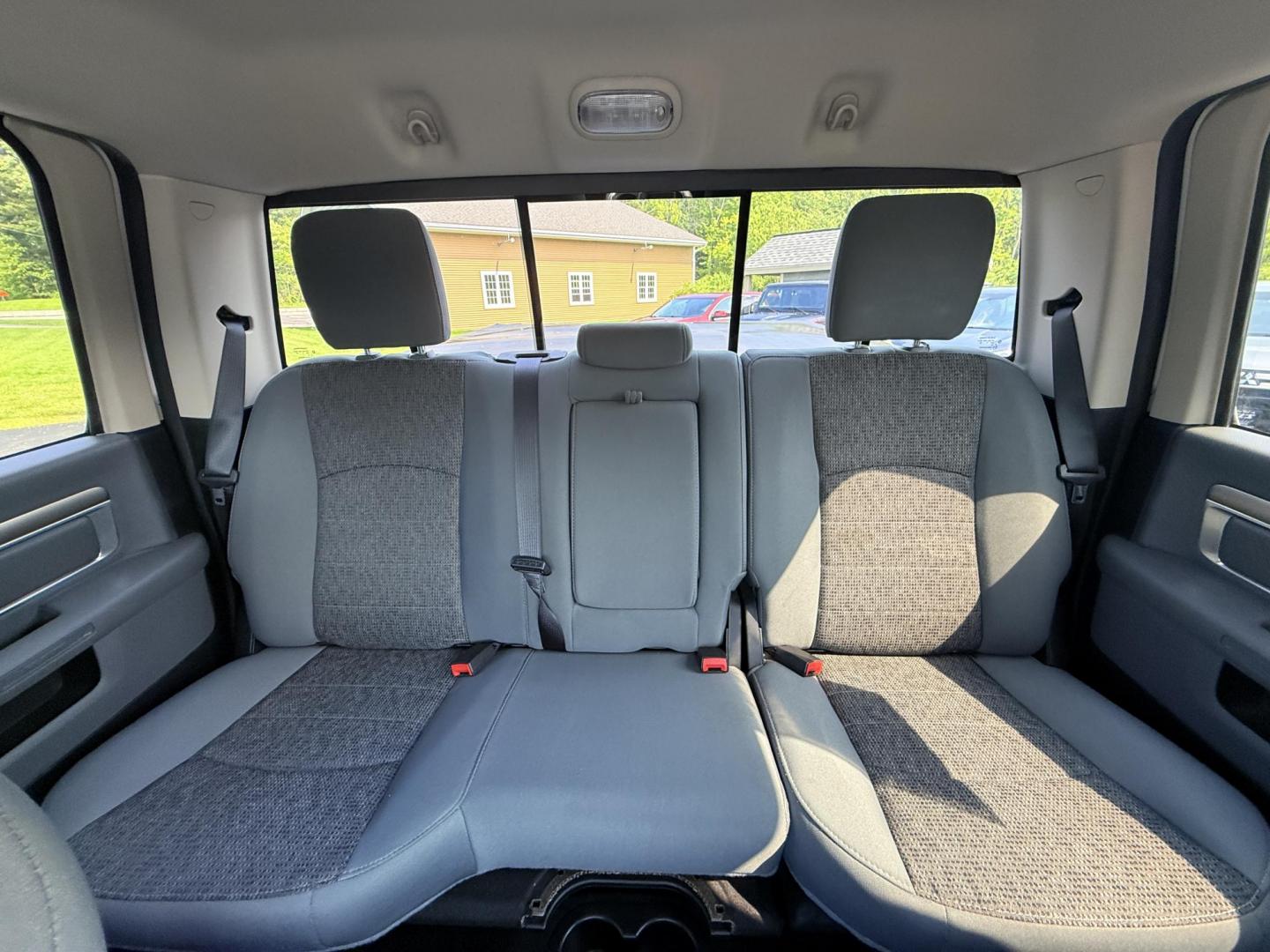 2016 White /Gray RAM 1500 Big Horn Crew Cab SWB 4WD (3C6RR7LT6GG) with an 5.7L V8 OHV 16V engine, 8-Speed Automatic transmission, located at 547 E. Main St., Orwell, OH, 44076, (440) 437-5893, 41.535435, -80.847855 - This 2016 Ram 1500 Big Horn Crew Cab is equipped with a robust 5.7L HEMI V8 engine paired with an 8-speed automatic transmission, offering a powerful performance and a 8,010-pound towing capacity. It features a comfortable interior with a power driver's seat and heated front seats, and is enhanced w - Photo#23