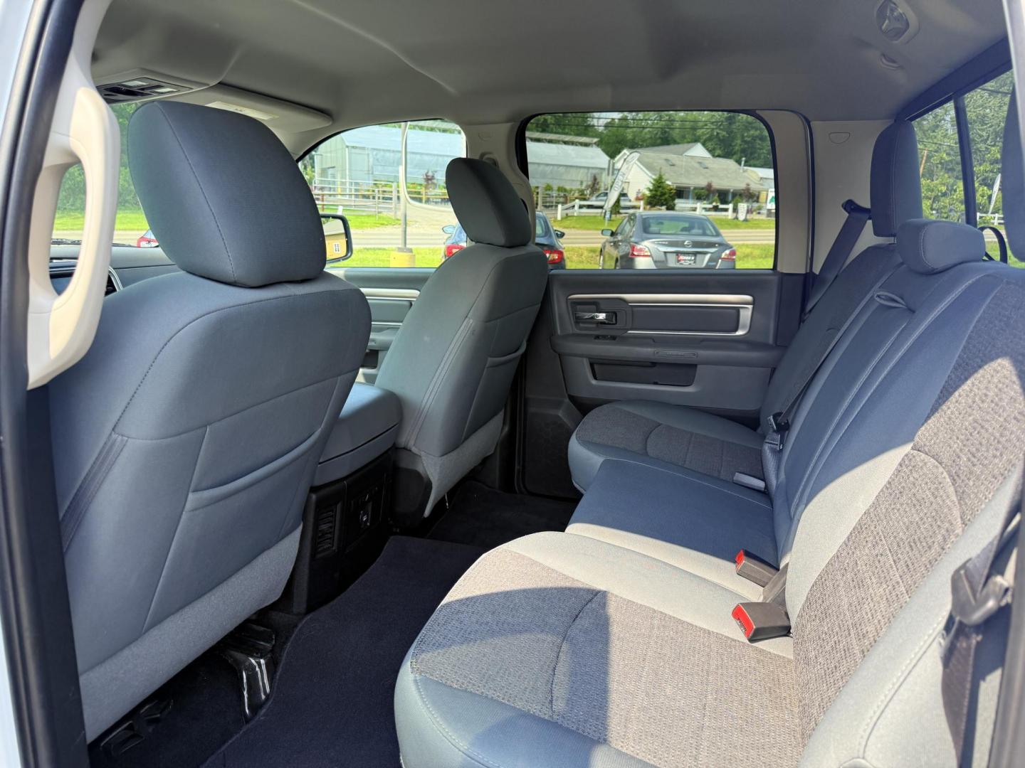 2016 White /Gray RAM 1500 Big Horn Crew Cab SWB 4WD (3C6RR7LT6GG) with an 5.7L V8 OHV 16V engine, 8-Speed Automatic transmission, located at 547 E. Main St., Orwell, OH, 44076, (440) 437-5893, 41.535435, -80.847855 - This 2016 Ram 1500 Big Horn Crew Cab is equipped with a robust 5.7L HEMI V8 engine paired with an 8-speed automatic transmission, offering a powerful performance and a 8,010-pound towing capacity. It features a comfortable interior with a power driver's seat and heated front seats, and is enhanced w - Photo#33