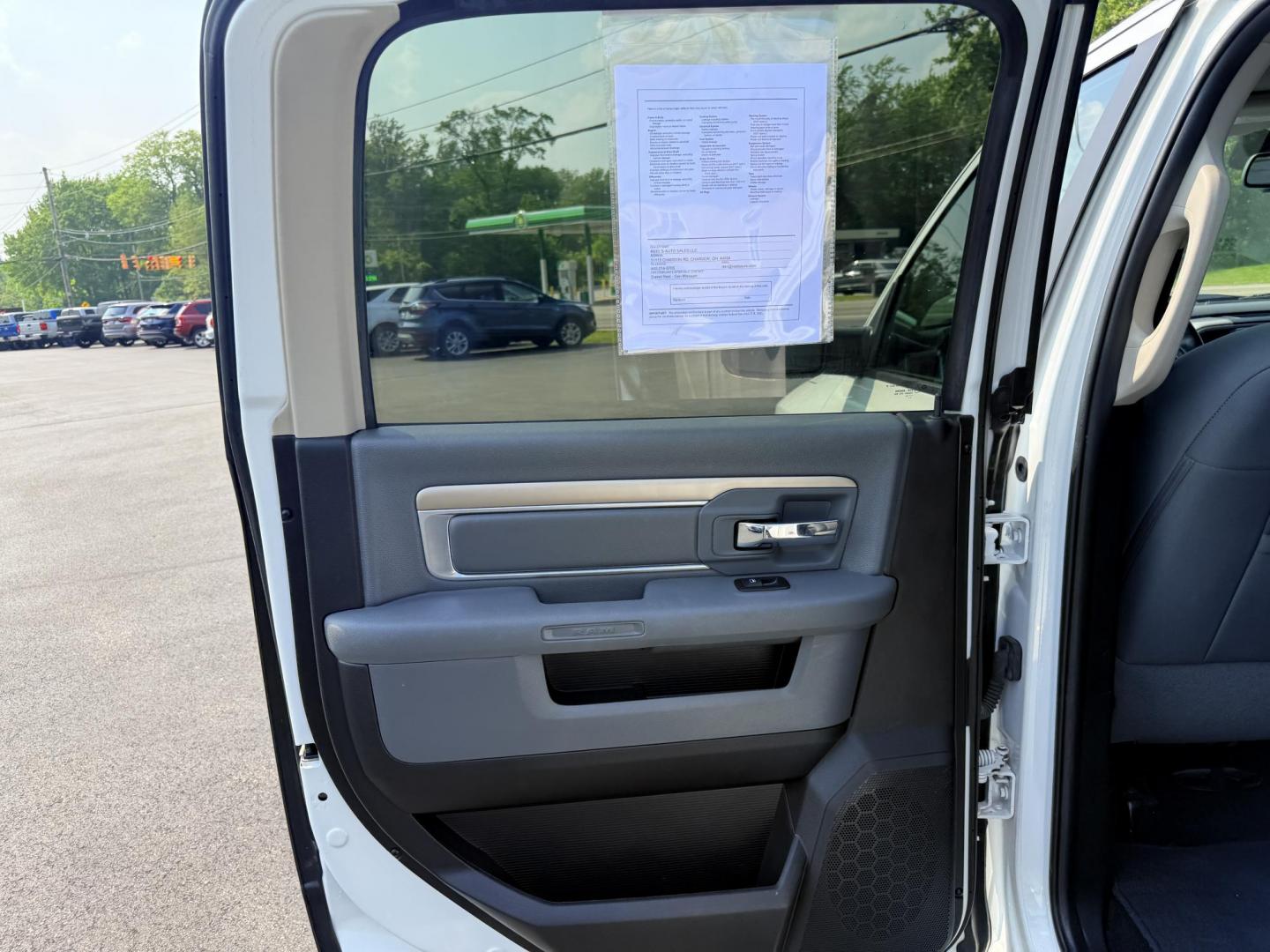 2016 White /Gray RAM 1500 Big Horn Crew Cab SWB 4WD (3C6RR7LT6GG) with an 5.7L V8 OHV 16V engine, 8-Speed Automatic transmission, located at 547 E. Main St., Orwell, OH, 44076, (440) 437-5893, 41.535435, -80.847855 - This 2016 Ram 1500 Big Horn Crew Cab is equipped with a robust 5.7L HEMI V8 engine paired with an 8-speed automatic transmission, offering a powerful performance and a 8,010-pound towing capacity. It features a comfortable interior with a power driver's seat and heated front seats, and is enhanced w - Photo#34