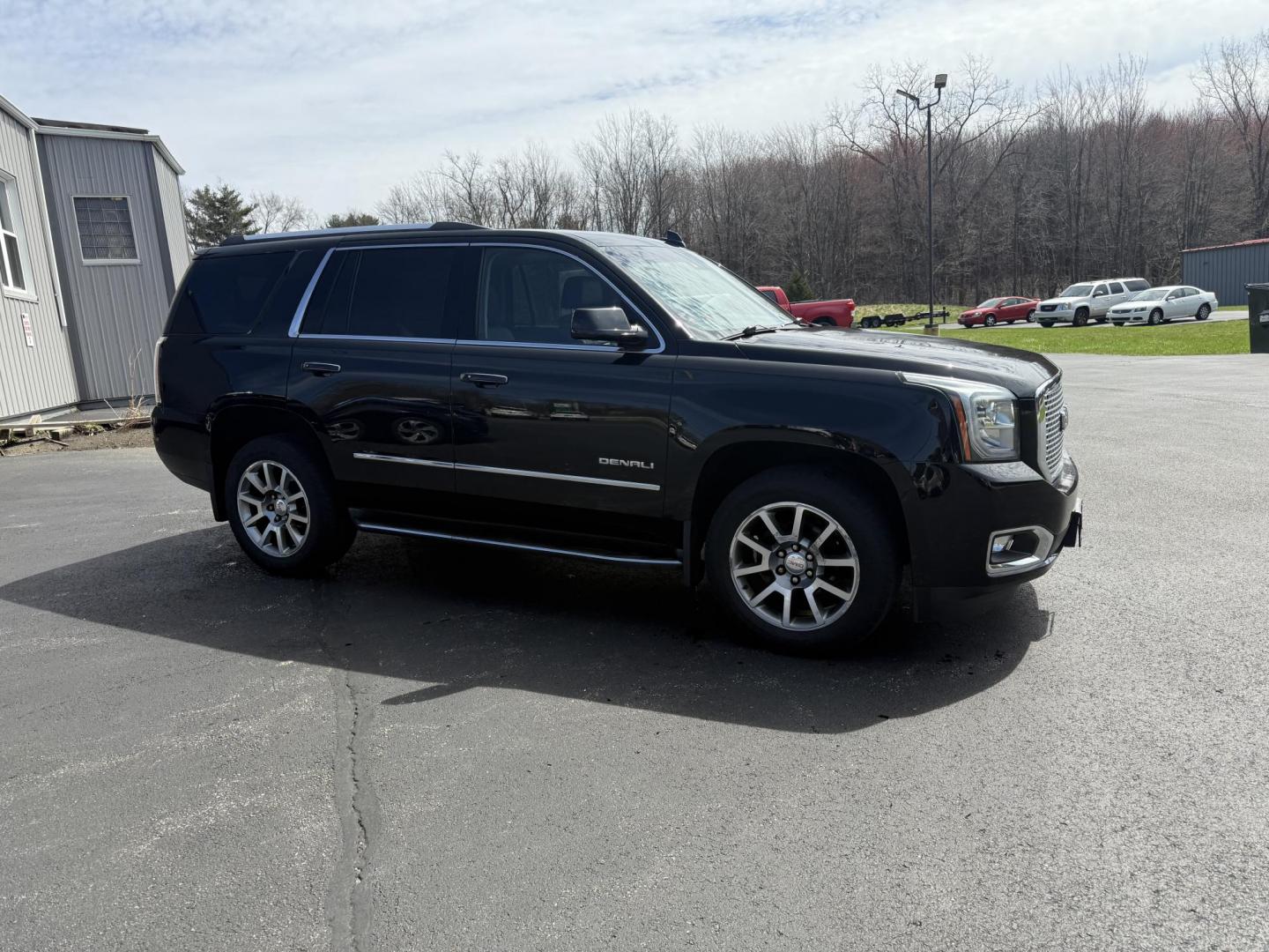 2015 Black /Black GMC Yukon Denali 4WD (1GKS2CKJXFR) with an 6.2L V8 OHV 16V engine, 8-Speed Automatic transmission, located at 11115 Chardon Rd. , Chardon, OH, 44024, (440) 214-9705, 41.580246, -81.241943 - Photo#3